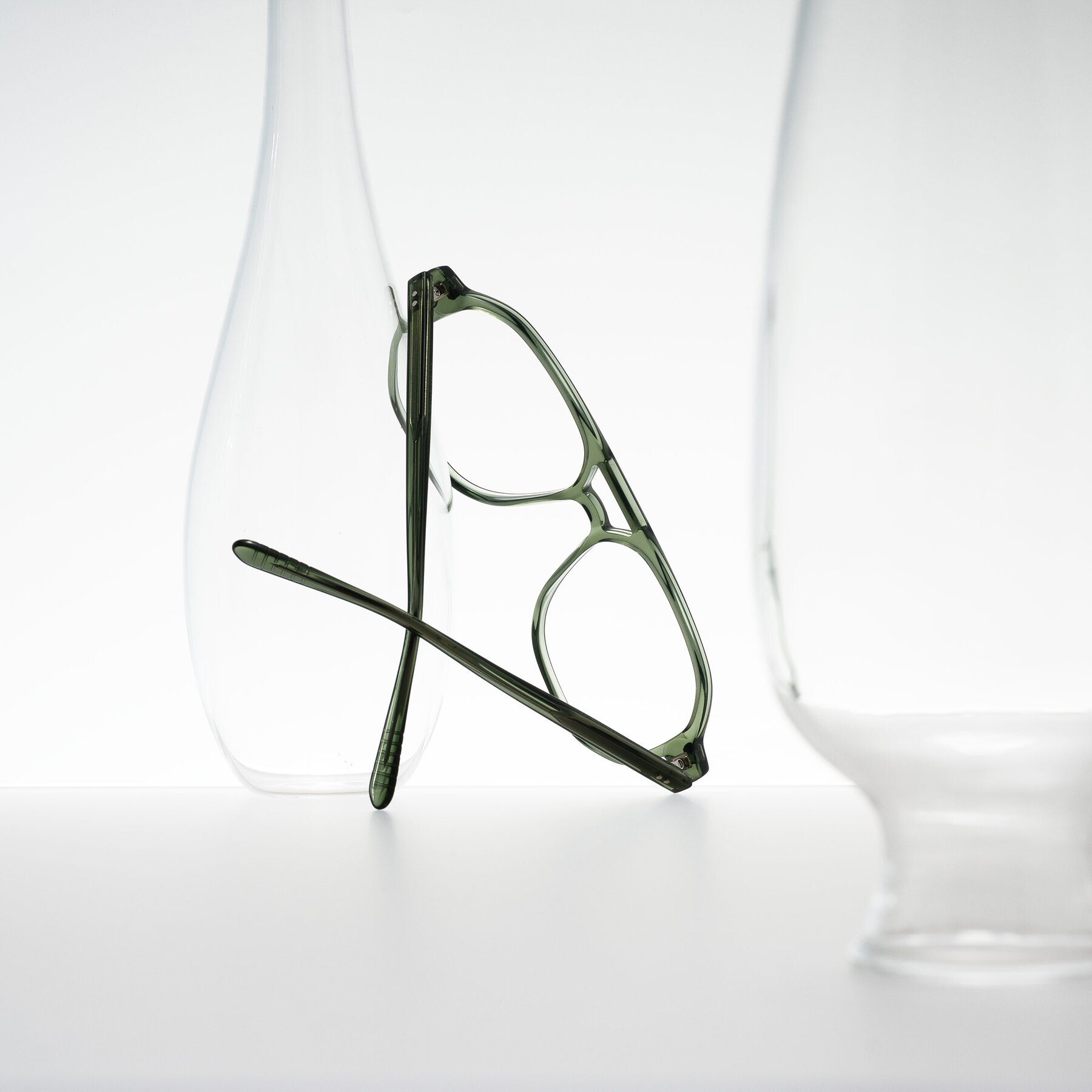 Lifestyle photography #2 of Aguilar in Transparent Green with Clear Eyeglass Lenses