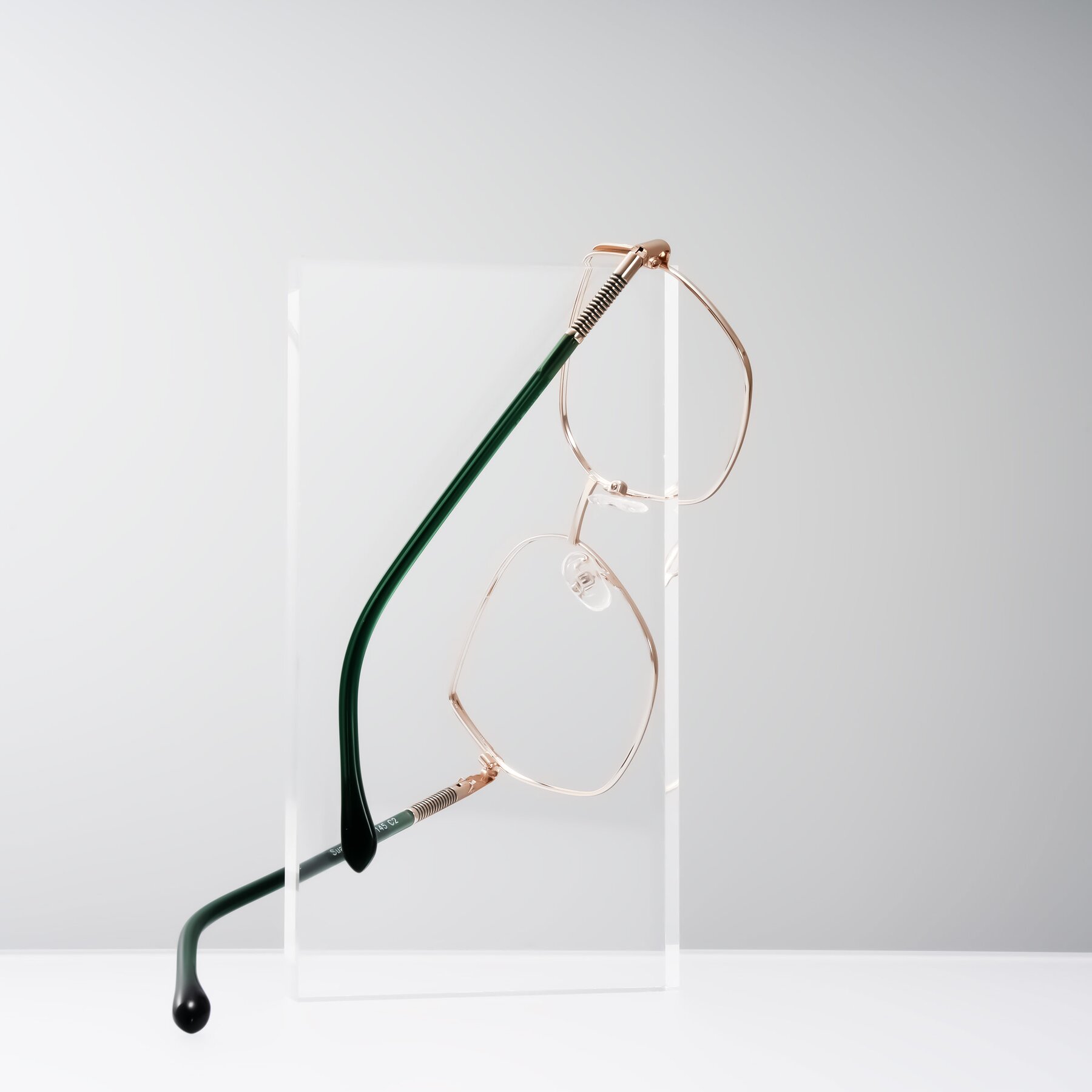 Lifestyle photography #2 of Suarie in Gold/Green with Clear Blue Light Blocking Lenses