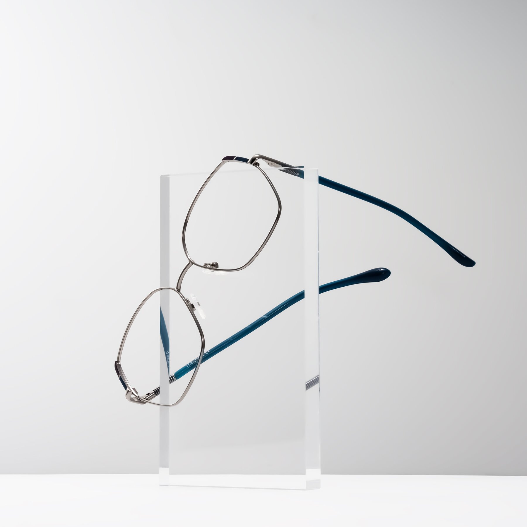 Lifestyle photography #1 of Suarie in Gunmetal/Teal with Clear Eyeglass Lenses