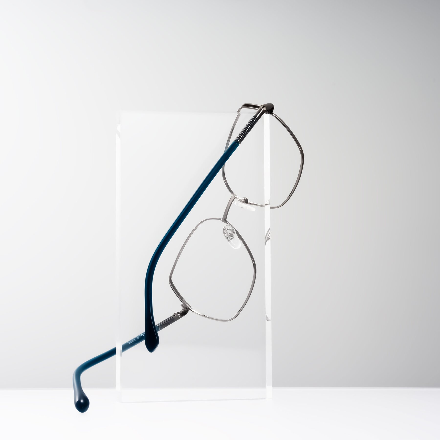 Lifestyle photography #2 of Suarie in Gunmetal/Teal with Clear Eyeglass Lenses