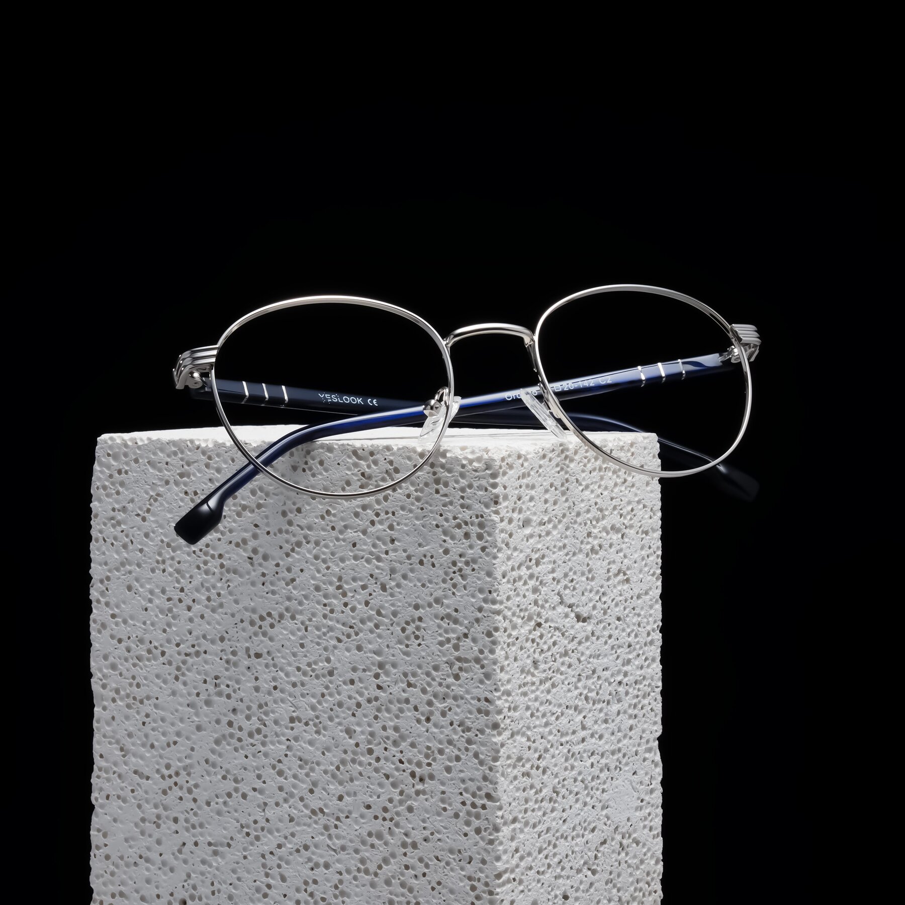 Lifestyle photography #1 of Orozco in Silver/Dark Blue with Clear Blue Light Blocking Lenses