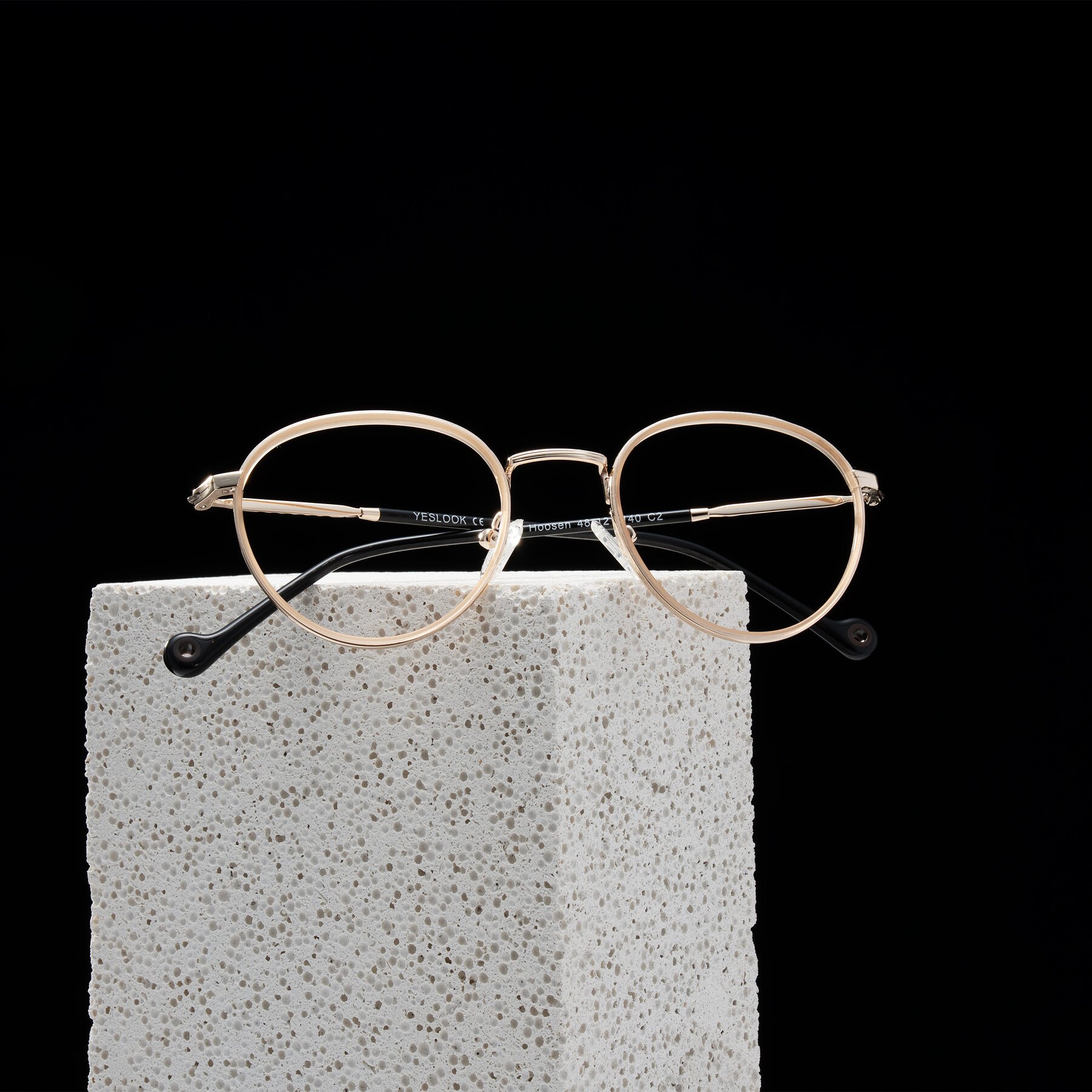 Lifestyle photography #1 of Hoosen in Beige/Gold with Clear Eyeglass Lenses