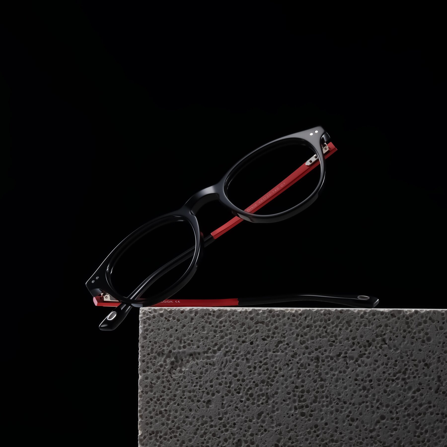 Lifestyle photography #2 of Orkid in Black/Red with Clear Eyeglass Lenses