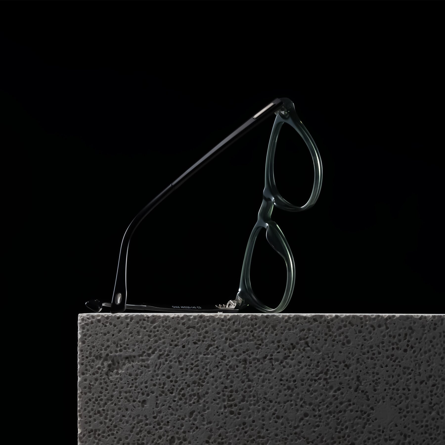 Lifestyle photography #2 of Orkid in Green/Black with Clear Blue Light Blocking Lenses