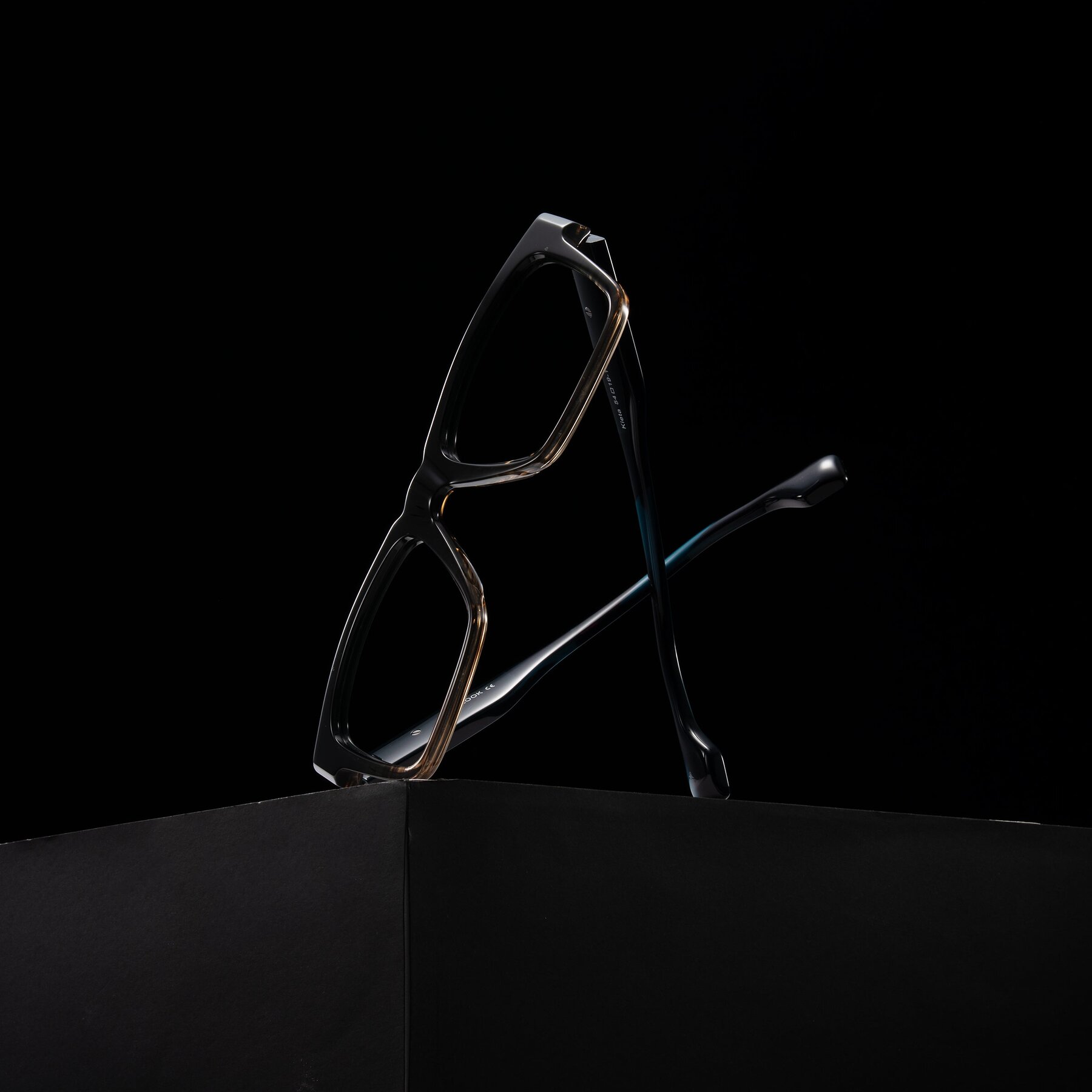 Lifestyle photography #2 of Kieta in Gradient Brown/Teal Striped with Clear Reading Eyeglass Lenses