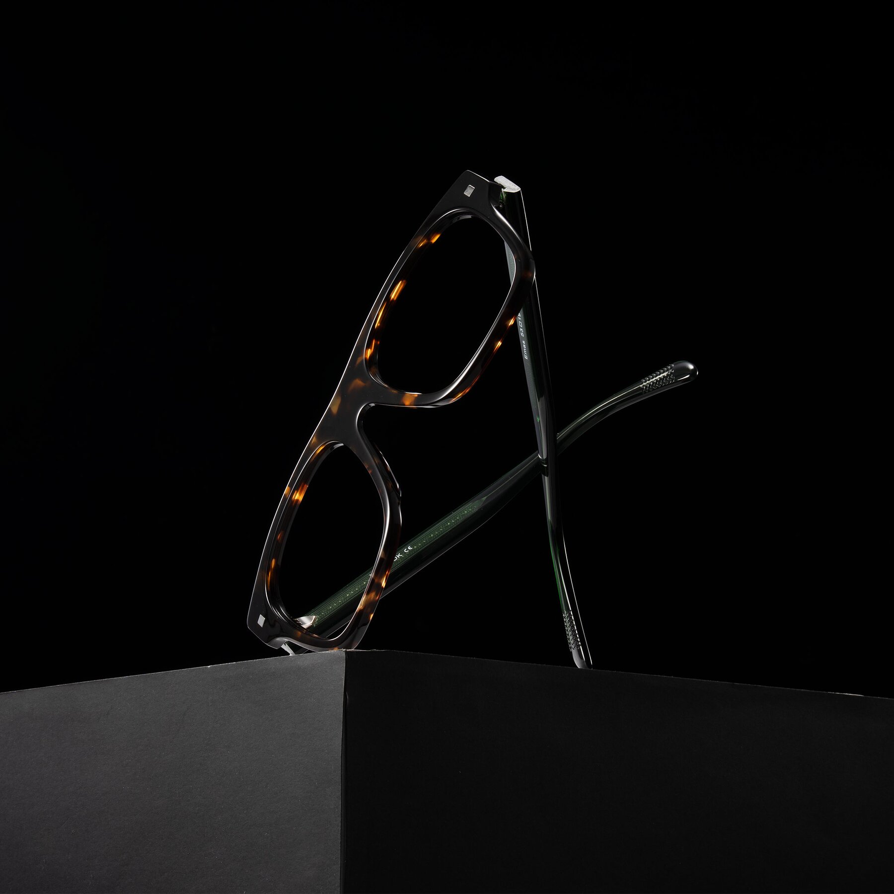 Lifestyle photography #1 of Emas in Tortoise/Green with Clear Eyeglass Lenses