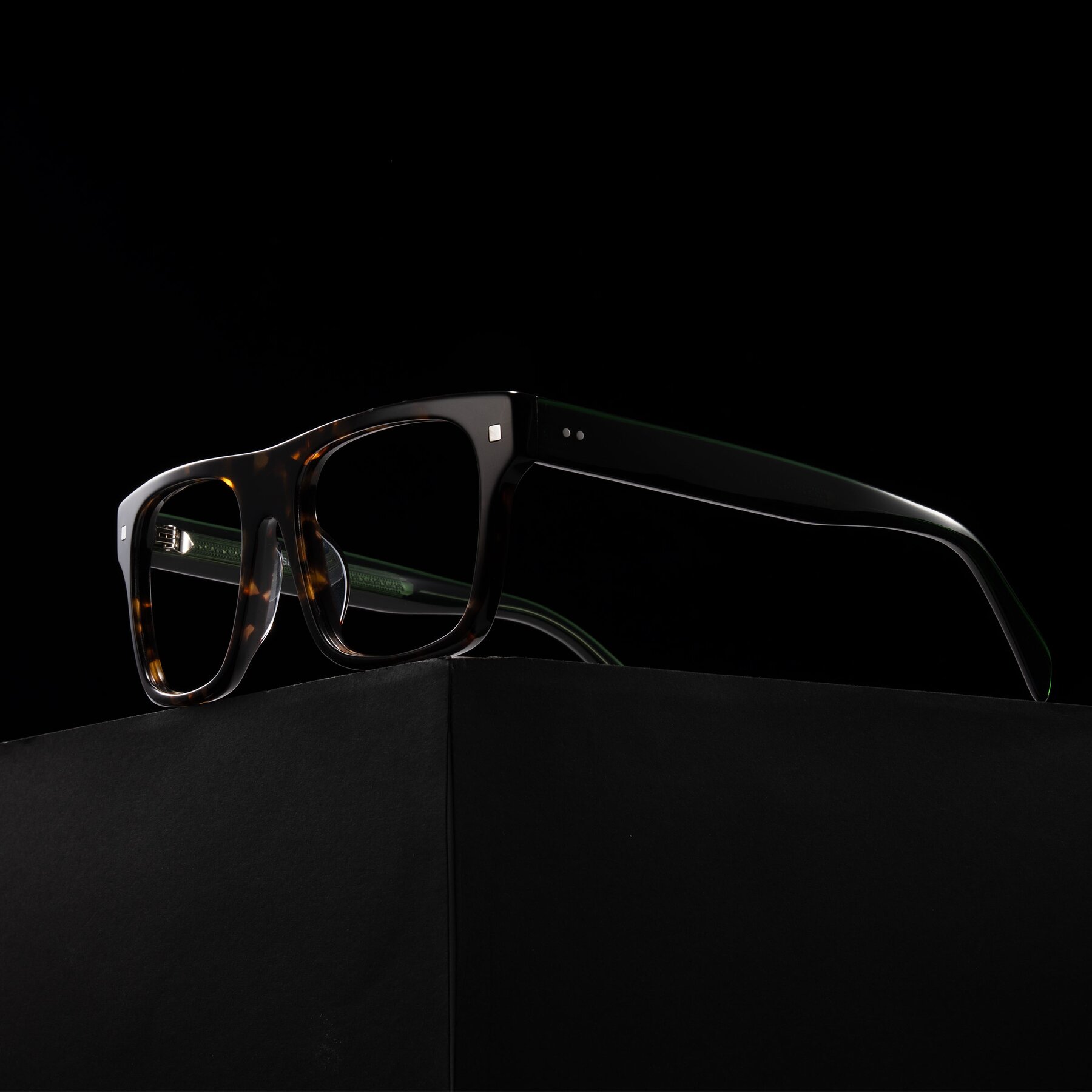 Lifestyle photography #2 of Emas in Tortoise/Green with Clear Eyeglass Lenses