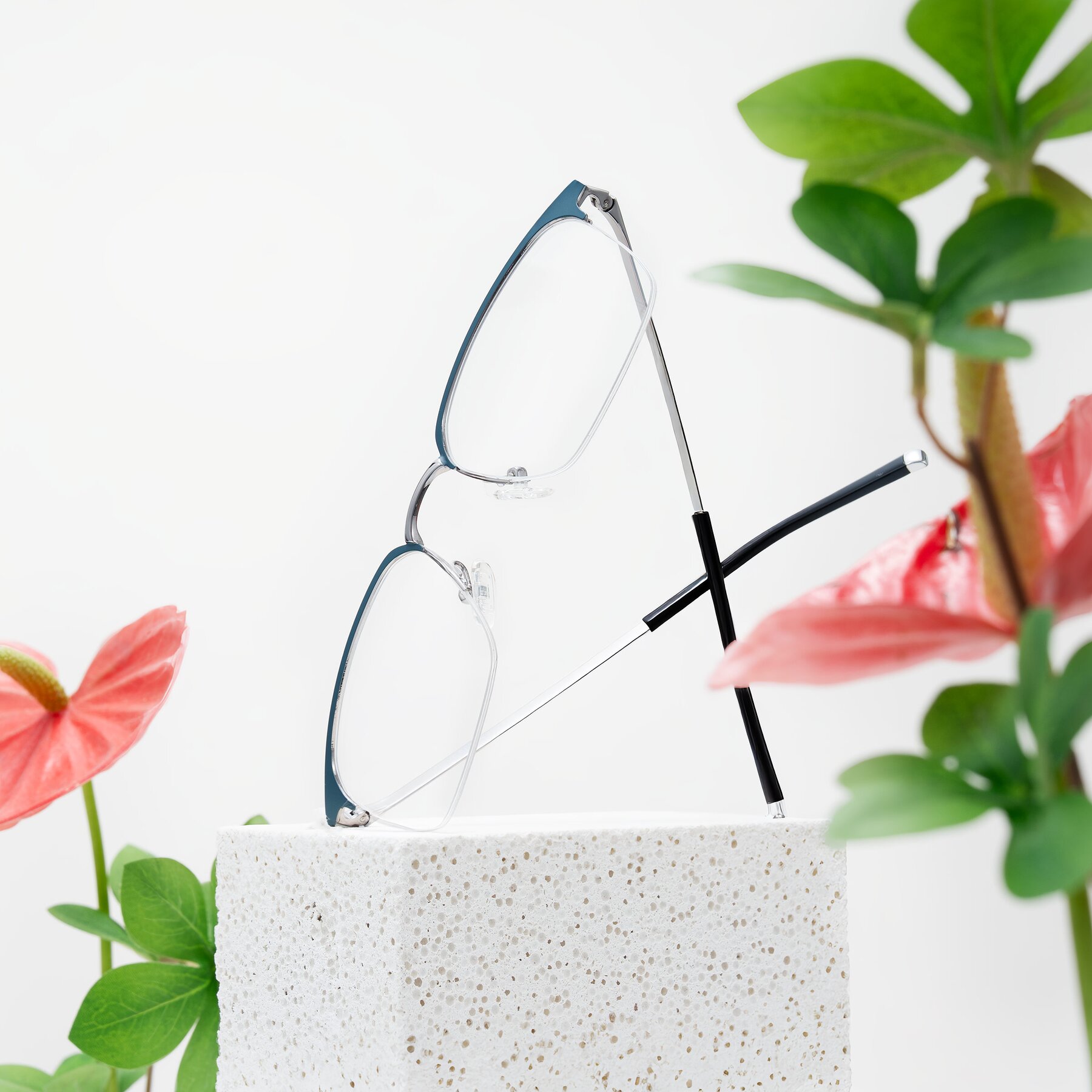 Lifestyle photography #2 of Volkho in Matte Teal/Gunmetal with Clear Eyeglass Lenses