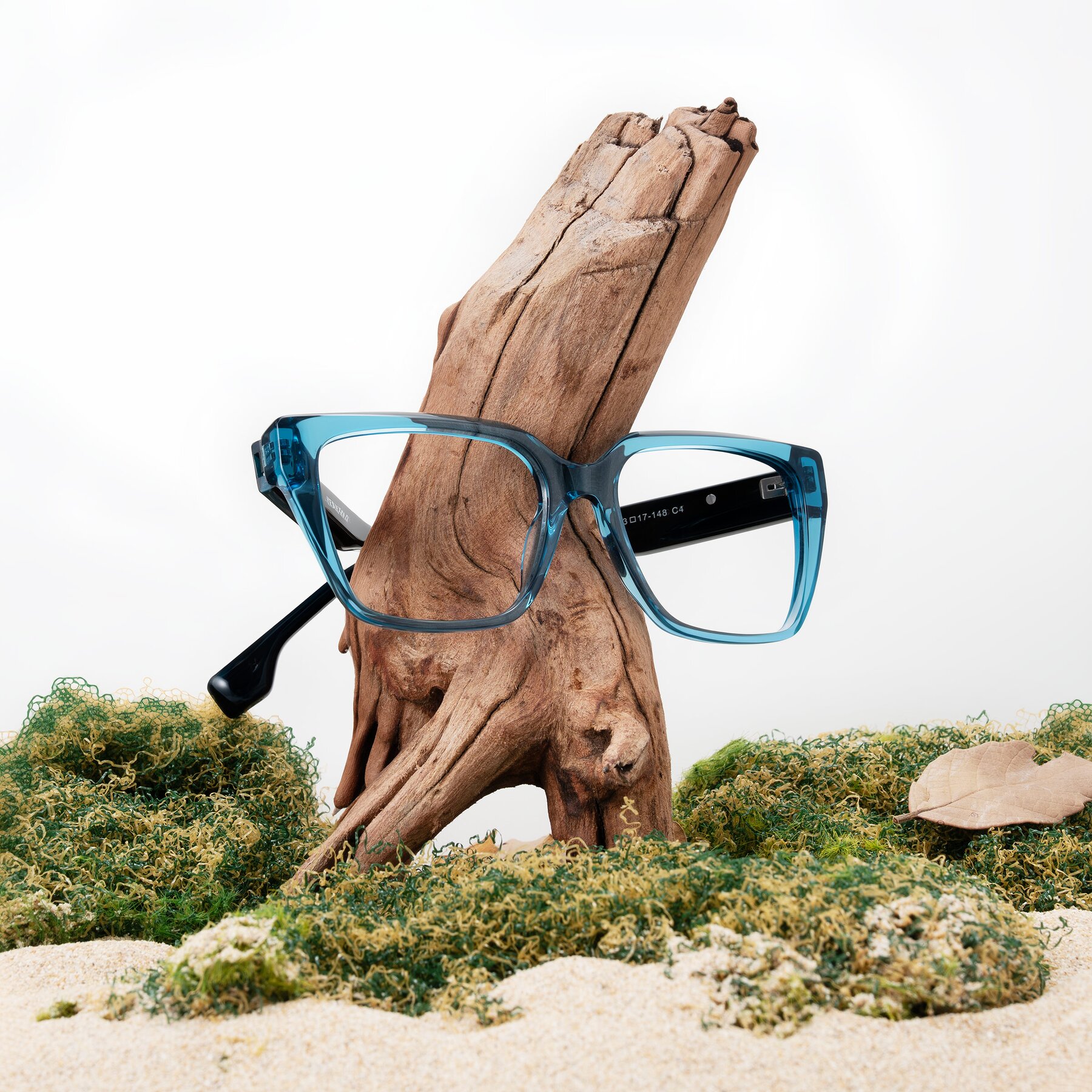 Lifestyle photography #1 of Gwee in Blue/Teal Striped with Clear Blue Light Blocking Lenses