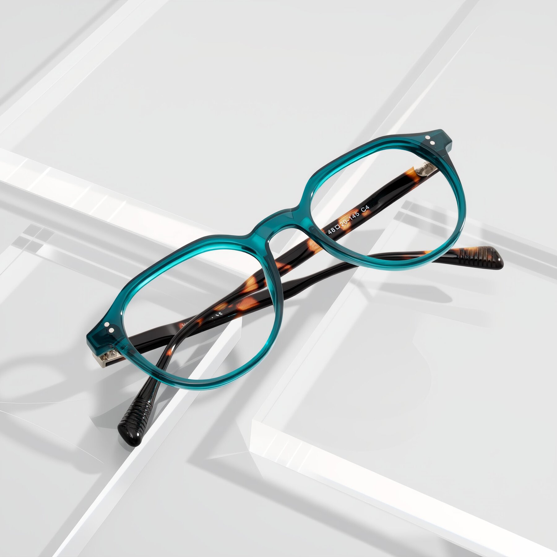 Lifestyle photography #1 of Cotaii in Emerald/Tortoise with Clear Eyeglass Lenses