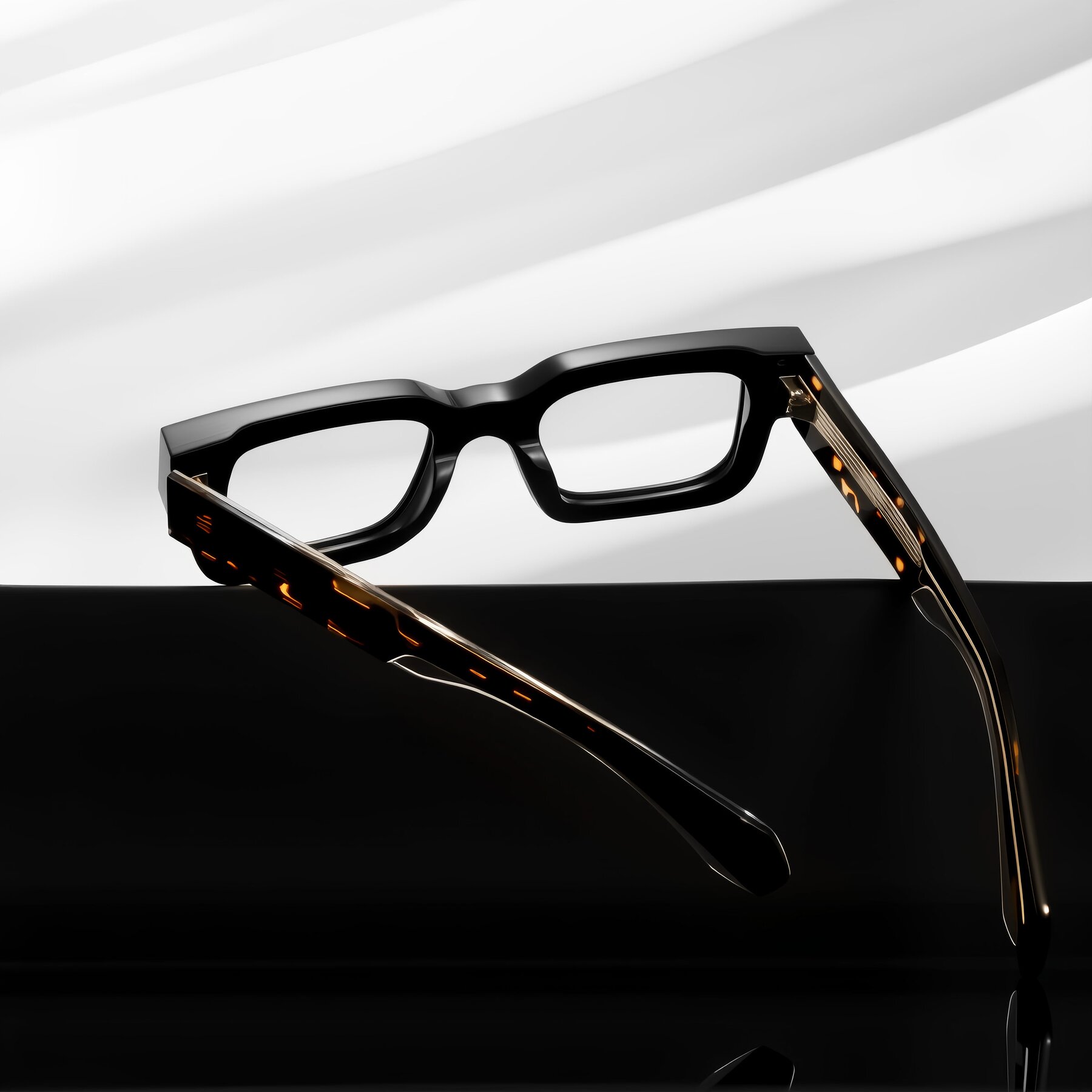 Lifestyle photography #2 of Nuria in Black/Tortoise with Clear Reading Eyeglass Lenses