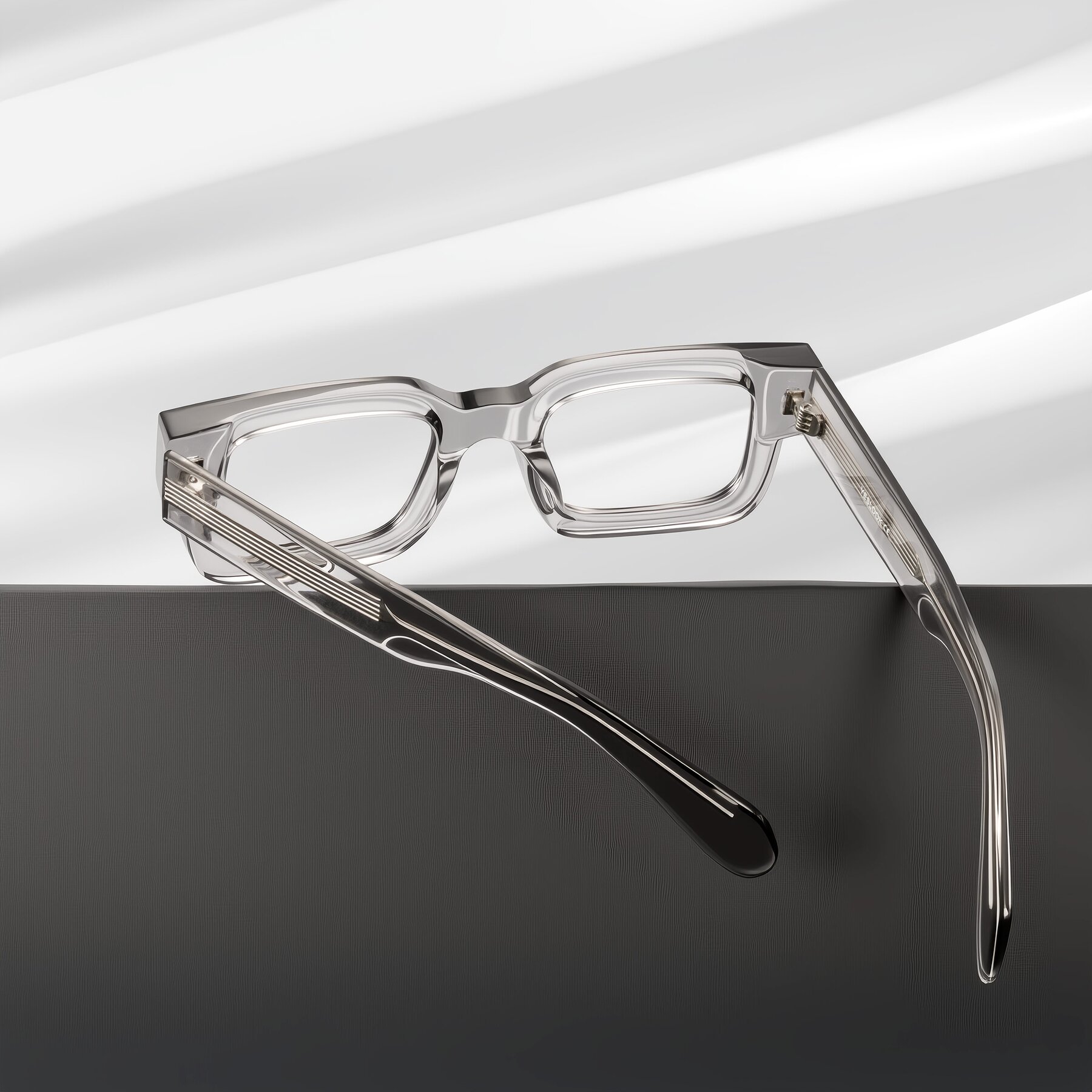 Lifestyle photography #2 of Nuria in Transparent Gray with Clear Blue Light Blocking Lenses