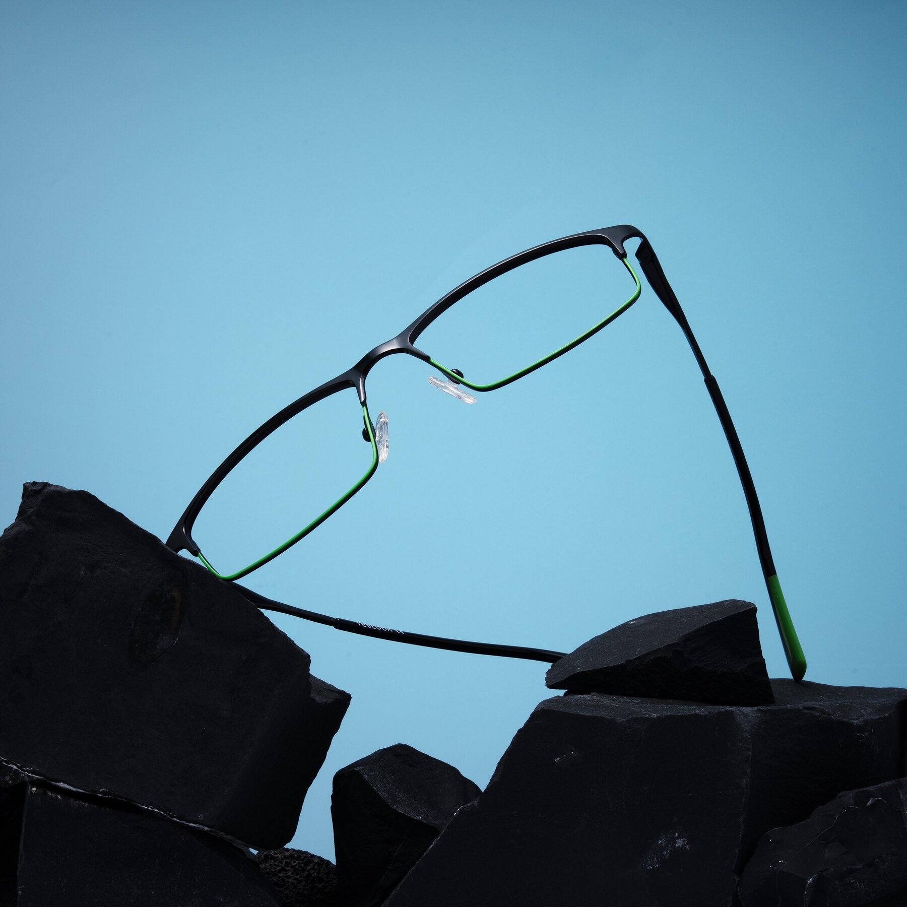 Lifestyle photography #1 of Monnow in Black/Green with Clear Blue Light Blocking Lenses