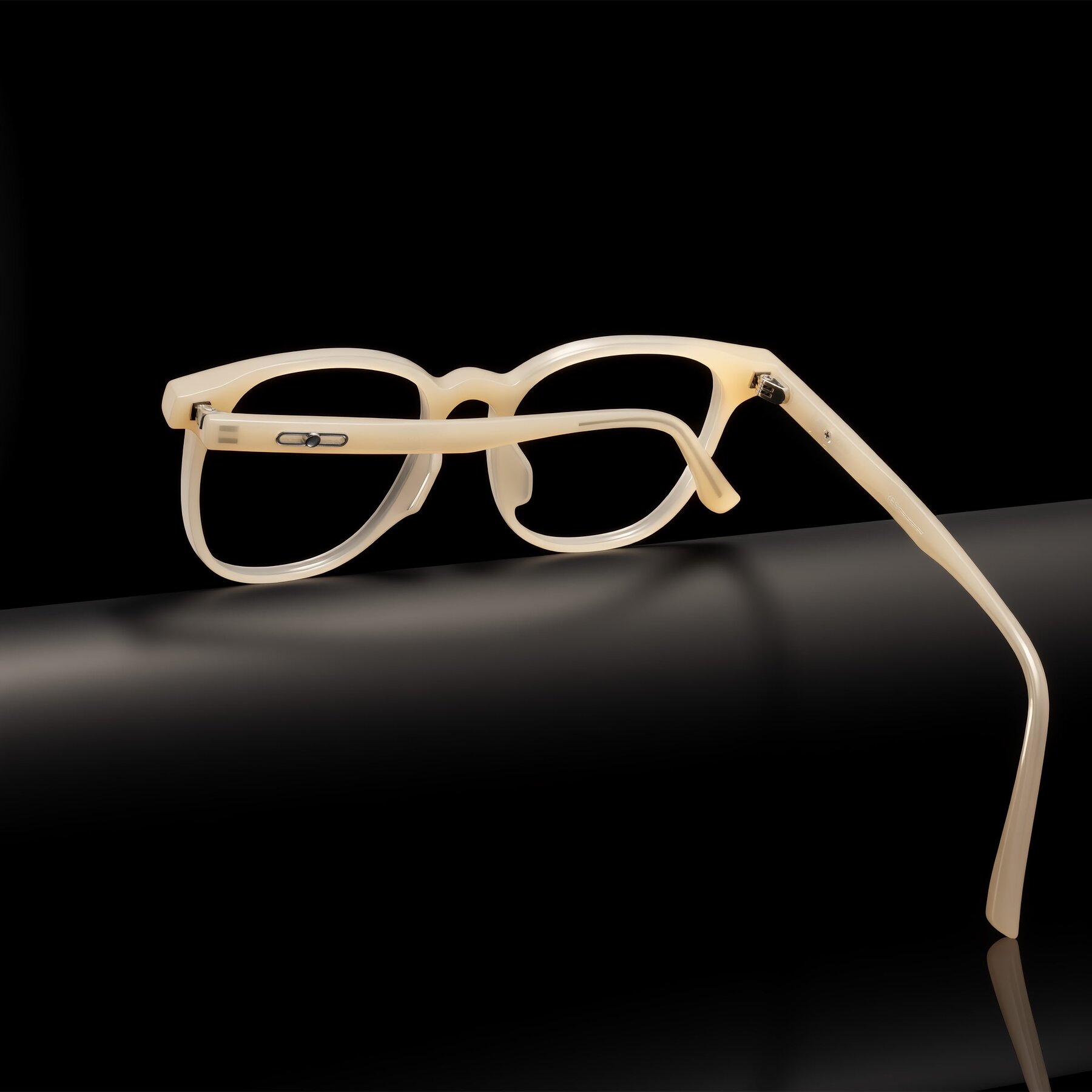 Lifestyle photography #2 of Ruhling in Apricot with Clear Eyeglass Lenses