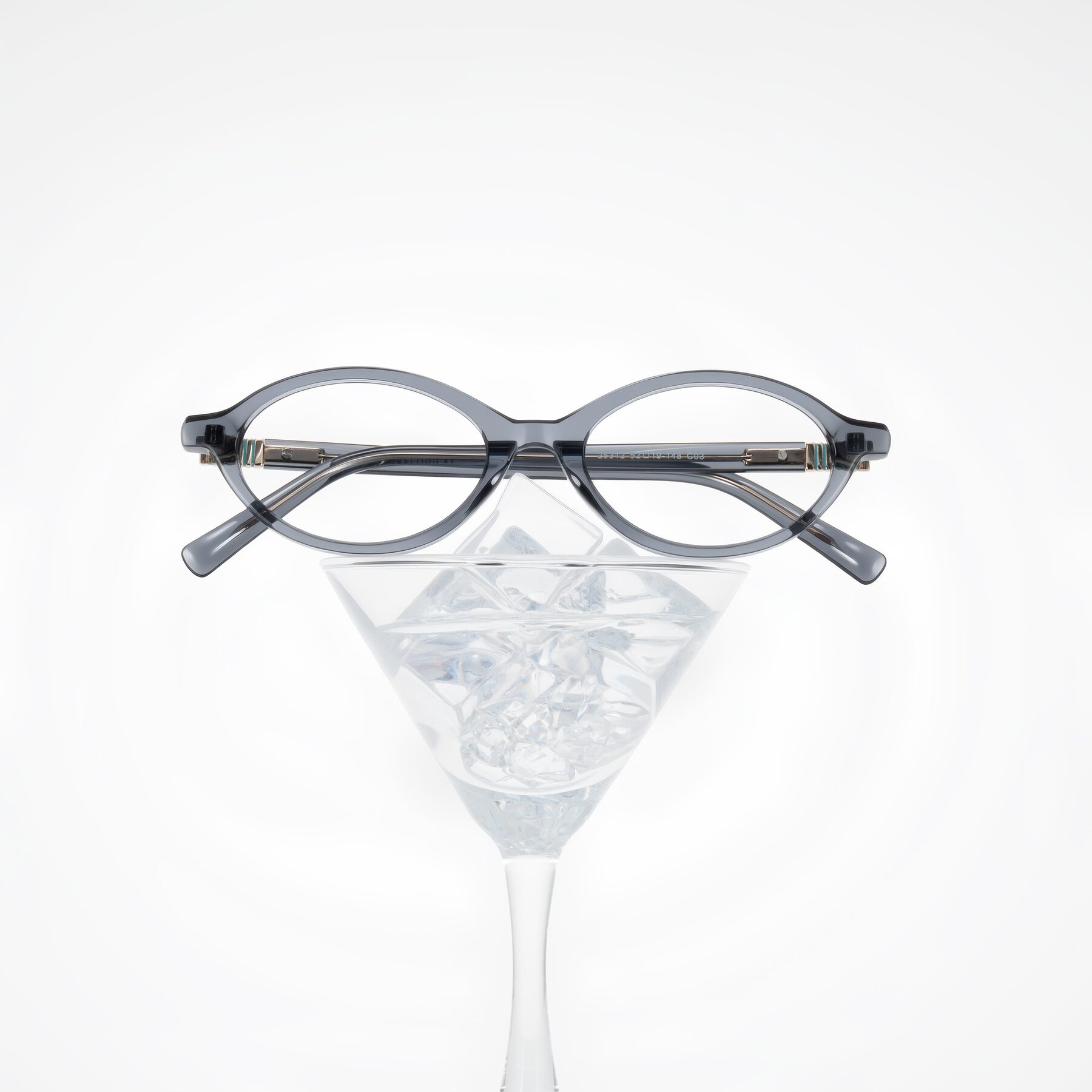 Lifestyle photography #1 of Noelle in Transparent Gray with Clear Eyeglass Lenses