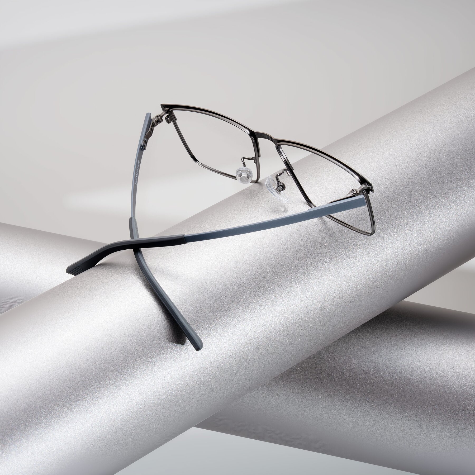 Men's lifestyle photography #2 of Leeth in Brushed Silver with Clear Eyeglass Lenses