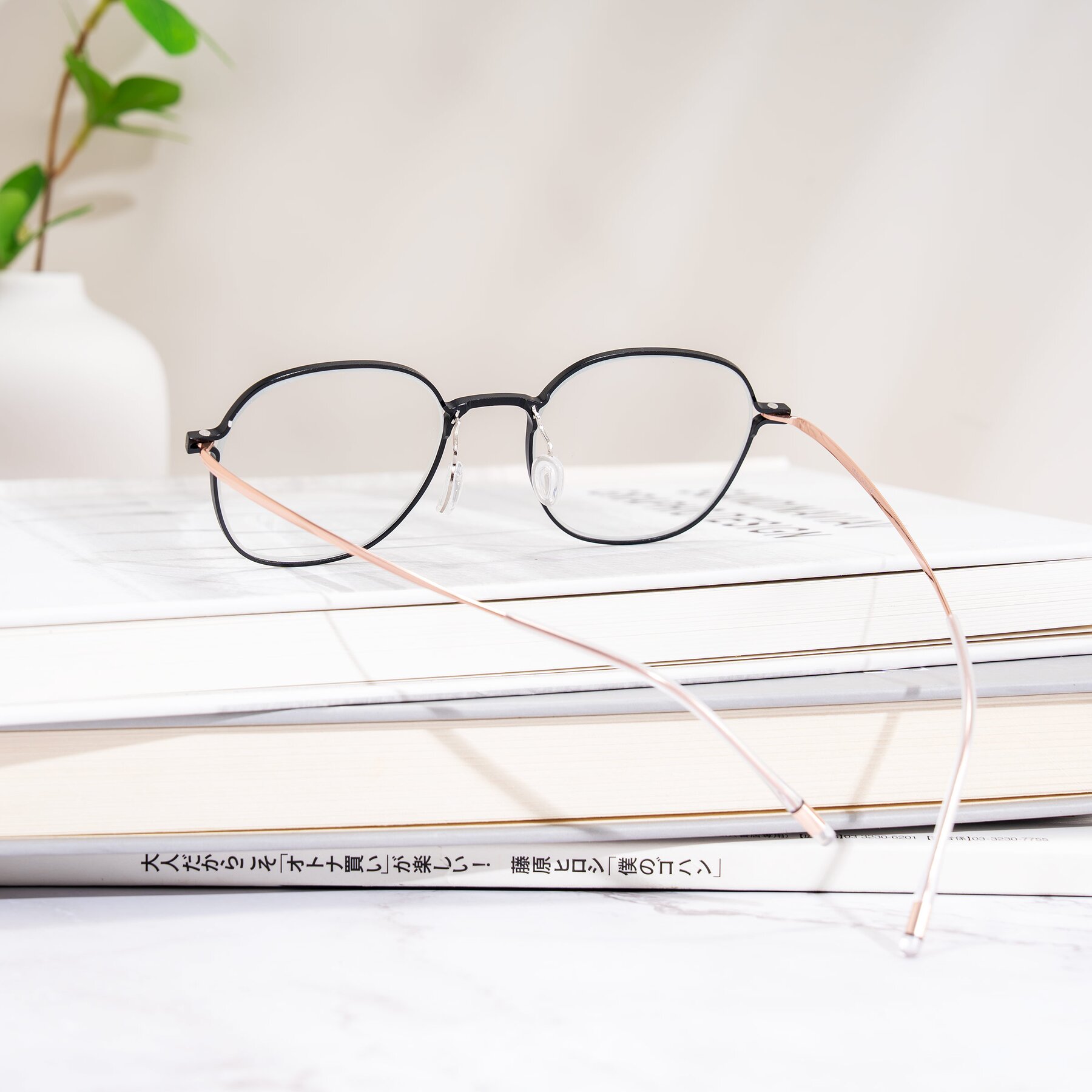 Lifestyle photography #2 of Lytle in Matte Black/Rose Glod with Clear Eyeglass Lenses
