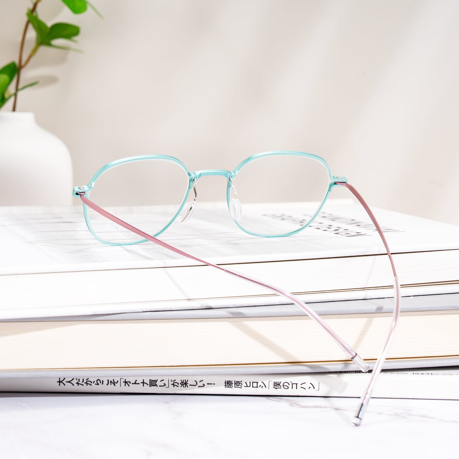 Lifestyle photography #2 of Lytle in Matte Teal/Pink with Clear Eyeglass Lenses