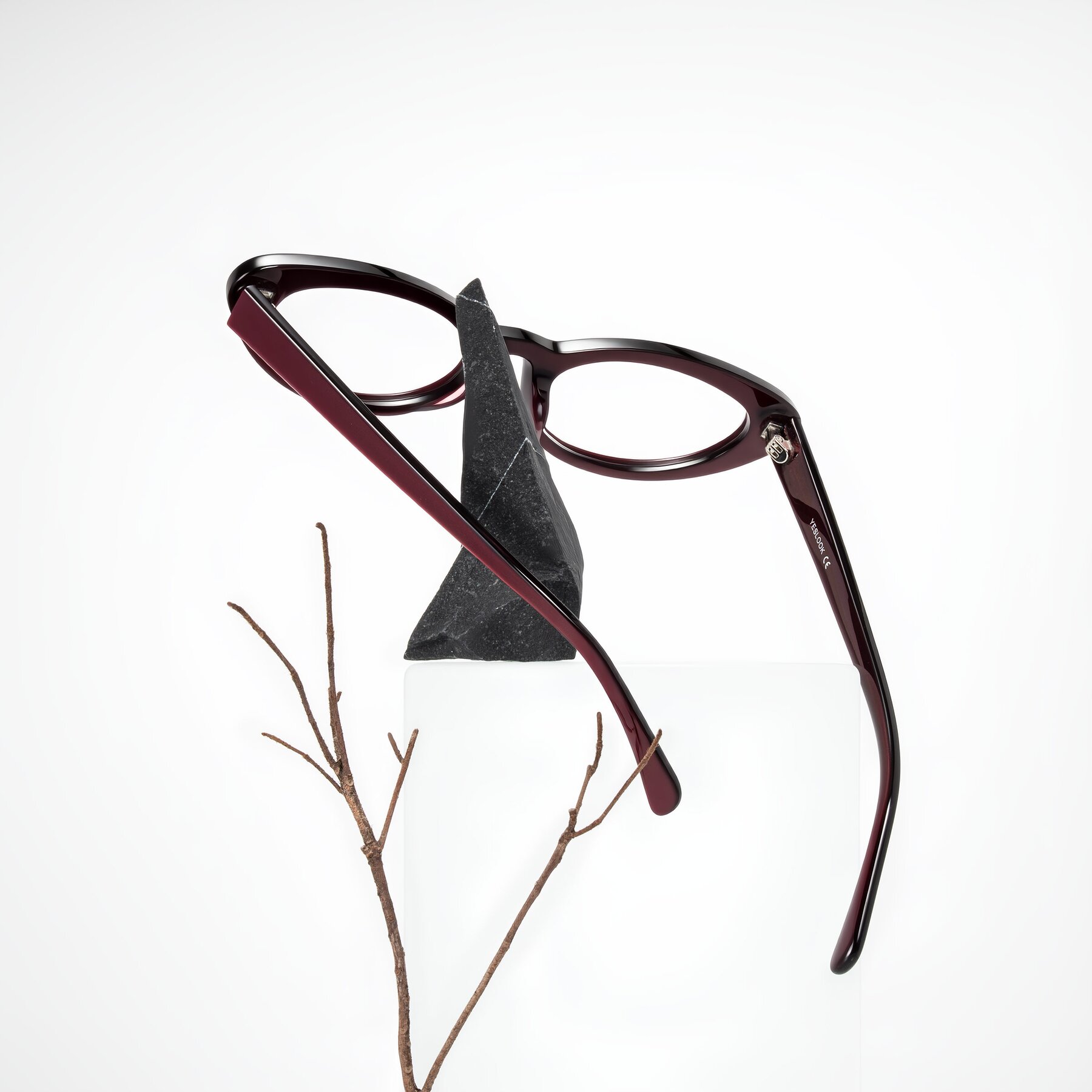 Lifestyle photography #2 of Baggot in Pearlescent Burgundy with Clear Eyeglass Lenses