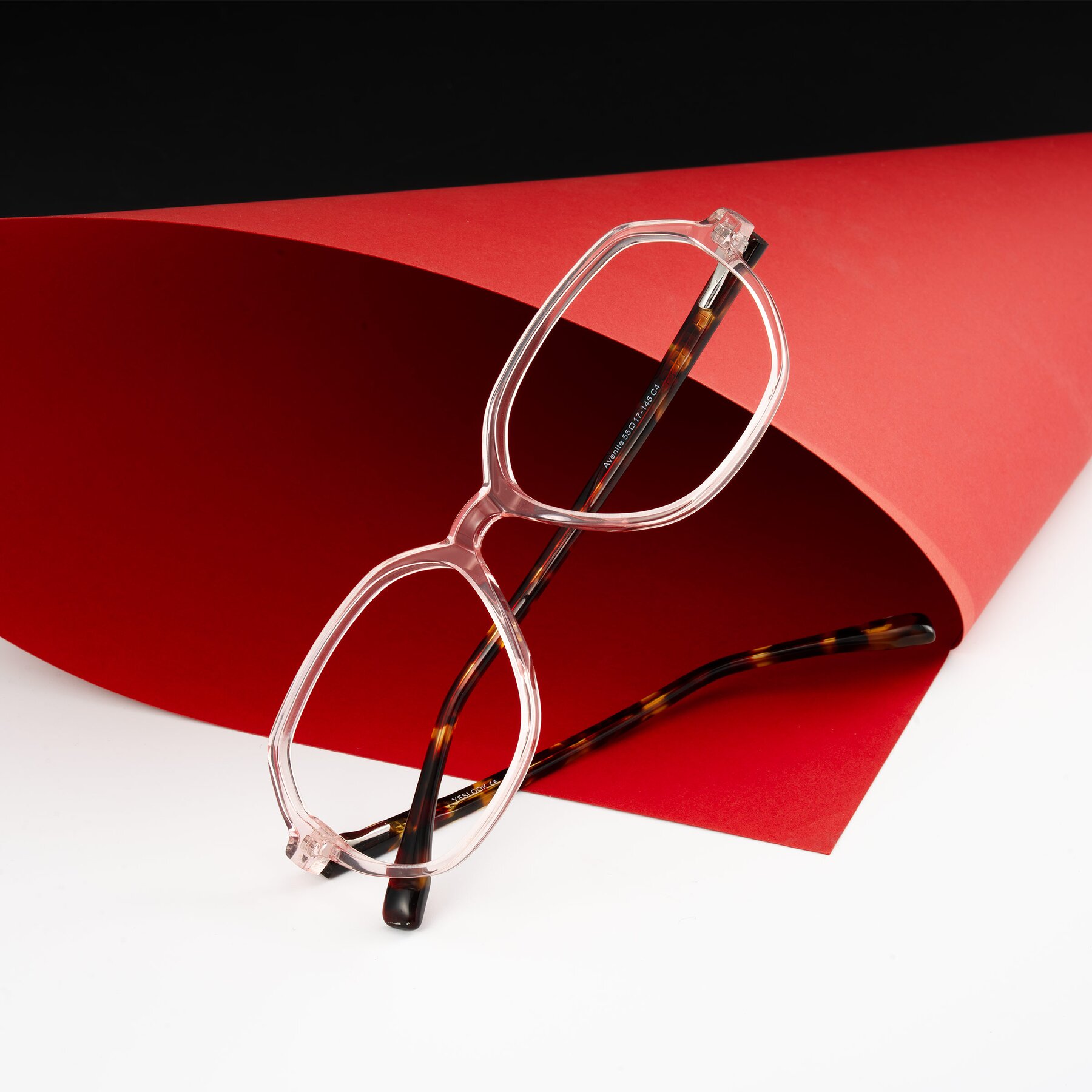 Lifestyle photography #1 of Avenite in Pink/Tortoise with Clear Eyeglass Lenses