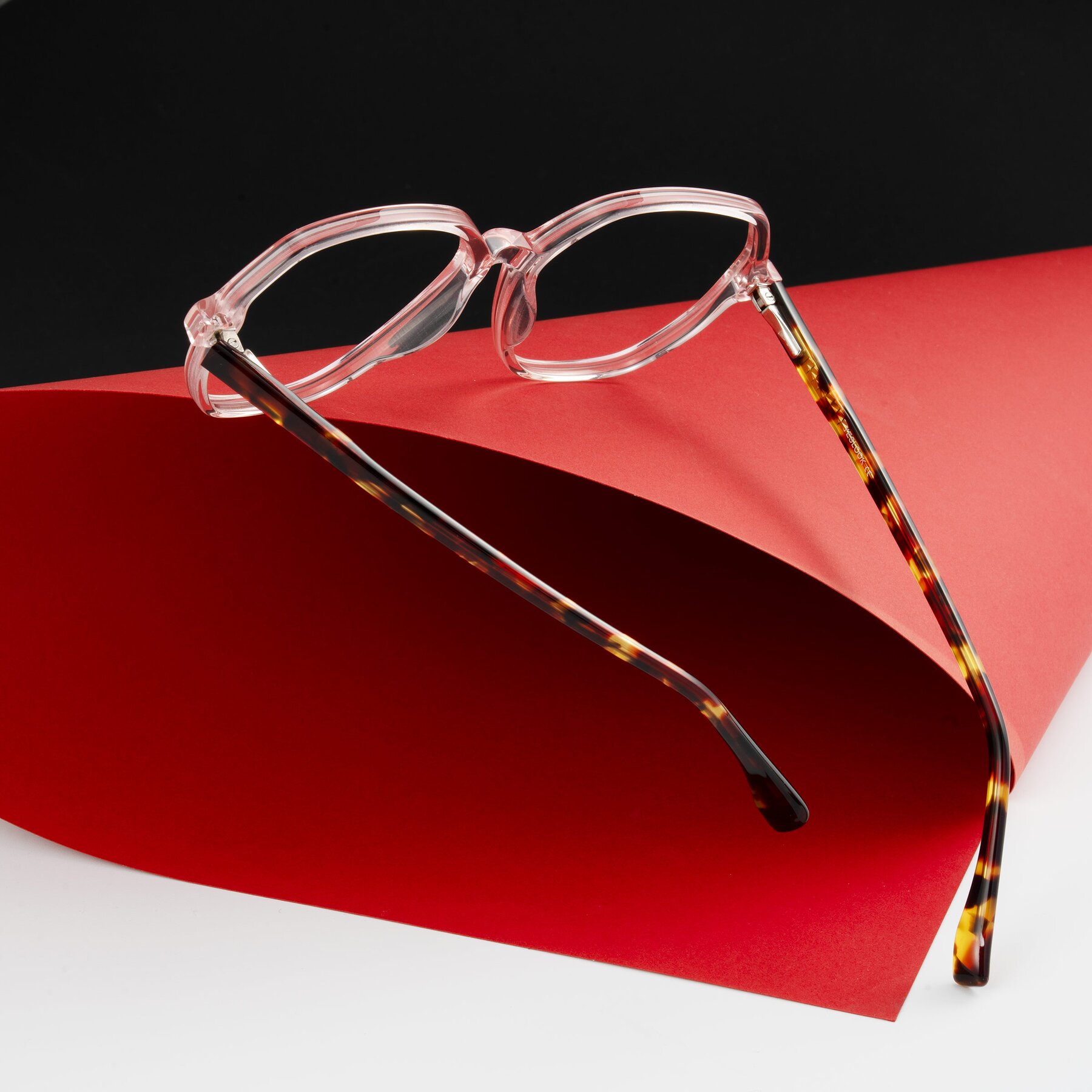 Lifestyle photography #2 of Avenite in Pink/Tortoise with Clear Eyeglass Lenses