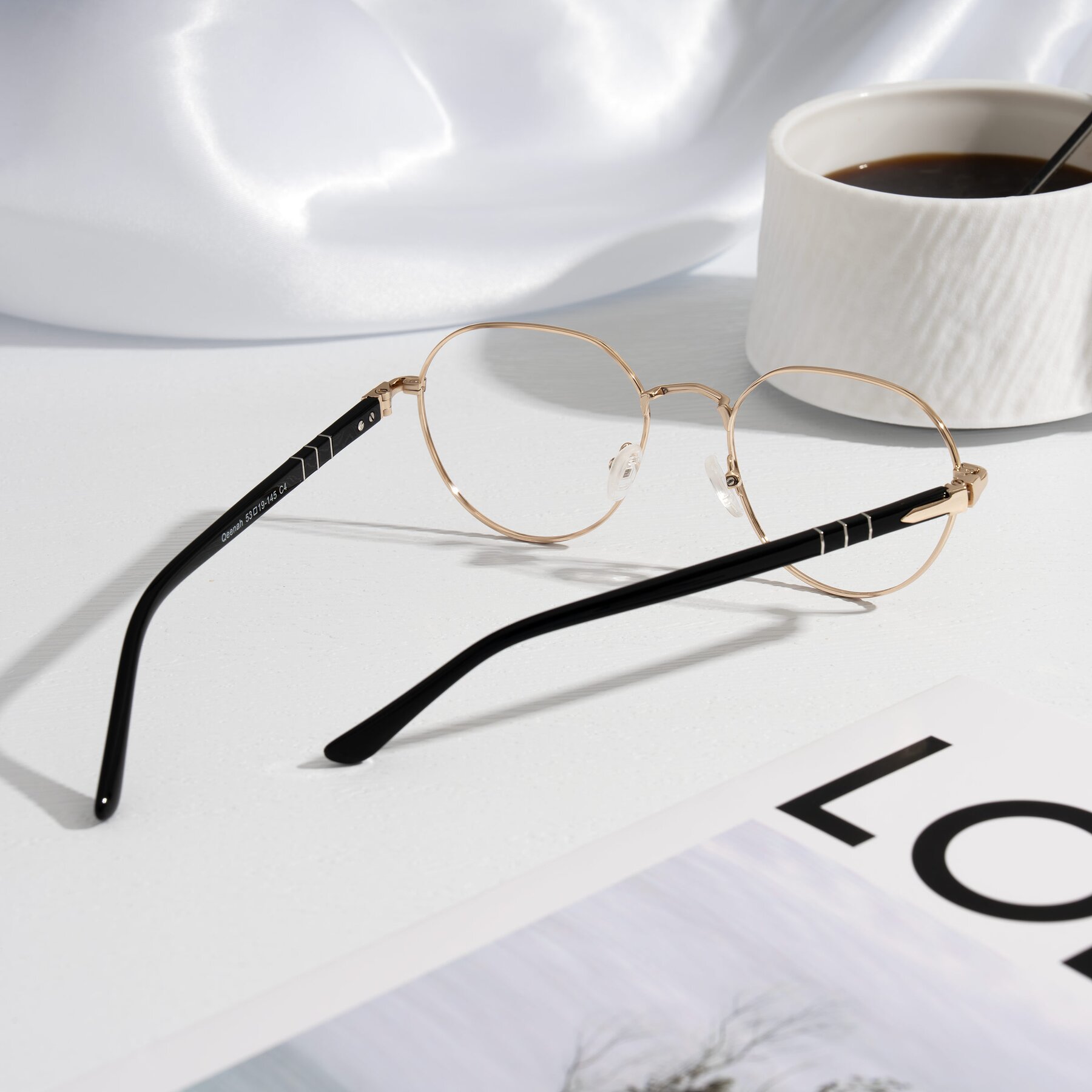 Lifestyle photography #2 of Qeenah in Black/Gold with Clear Blue Light Blocking Lenses