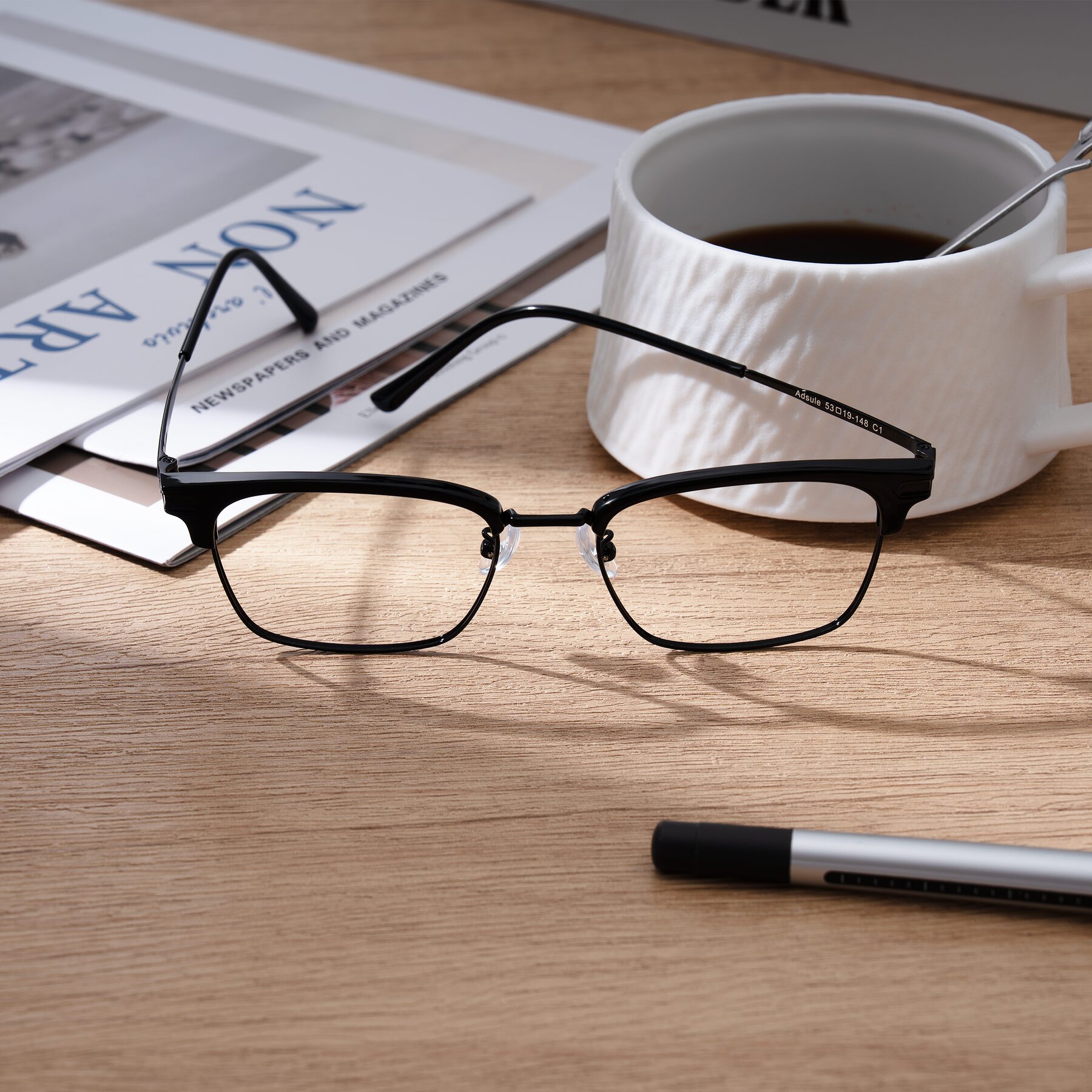 Lifestyle photography #1 of Adsule in Black with Clear Blue Light Blocking Lenses