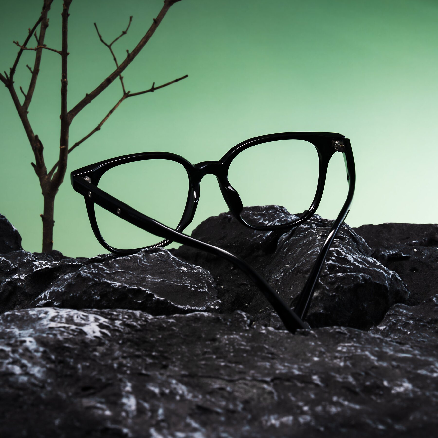 Lifestyle photography #2 of Lozzuri in Black with Clear Reading Eyeglass Lenses