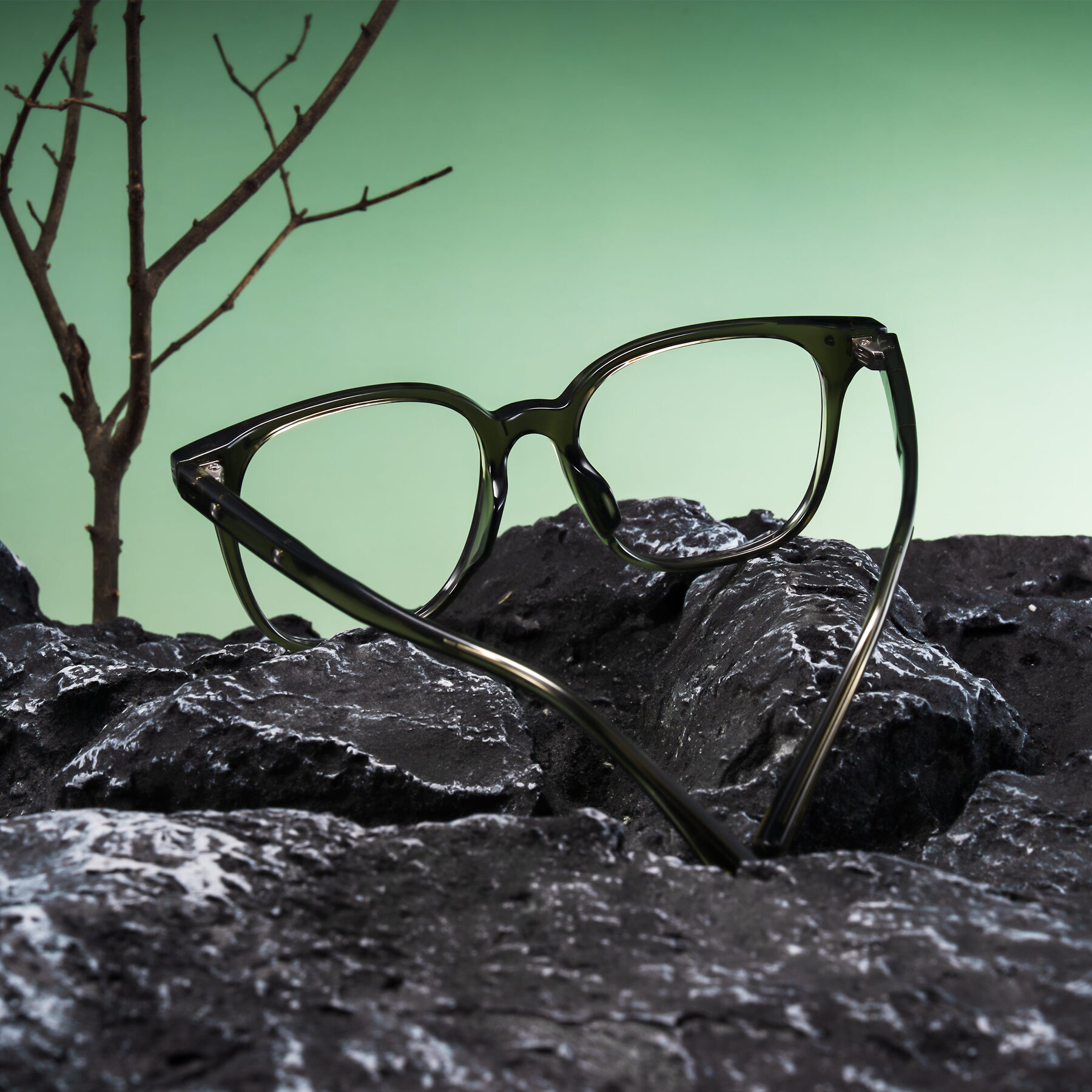 Lifestyle photography #2 of Lozzuri in Translucent Green with Clear Reading Eyeglass Lenses