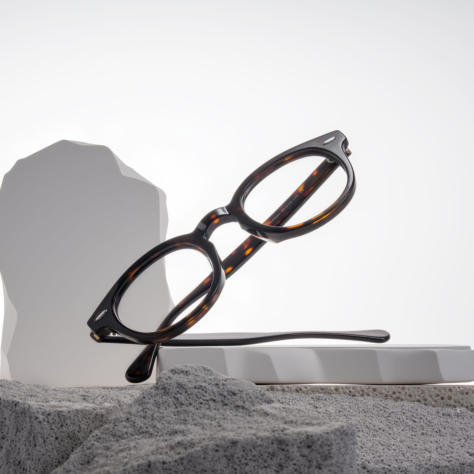 Lifestyle photography #1 of Estean in Dark Tortoise with Clear Eyeglass Lenses