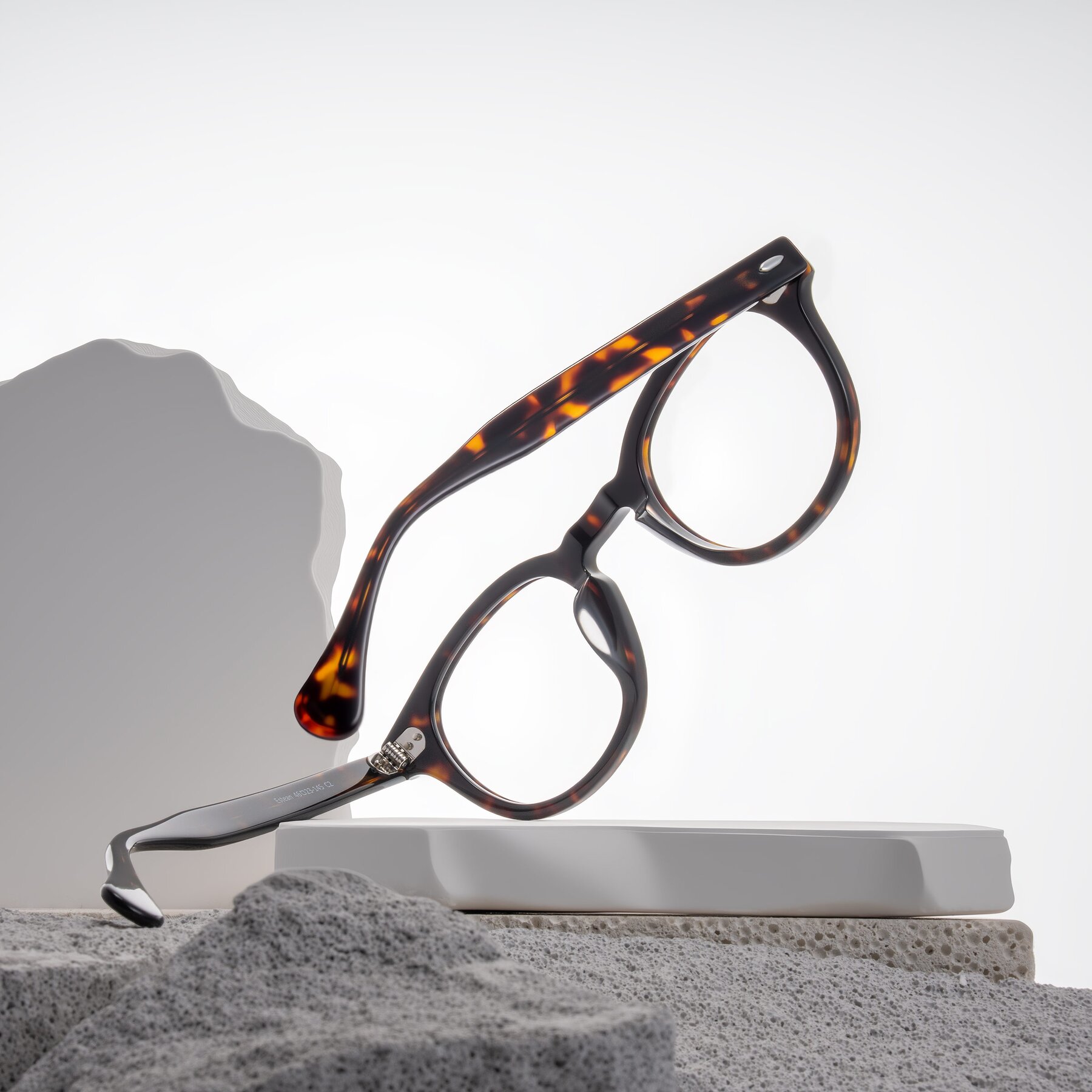 Lifestyle photography #2 of Estean in Dark Tortoise with Clear Eyeglass Lenses