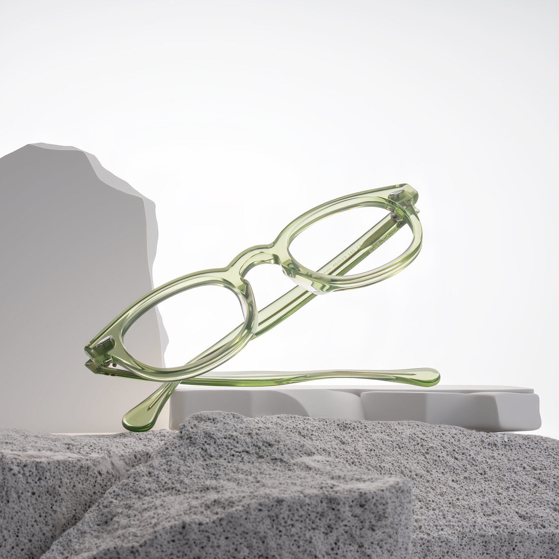 Lifestyle photography #1 of Estean in Transparent Green with Clear Eyeglass Lenses