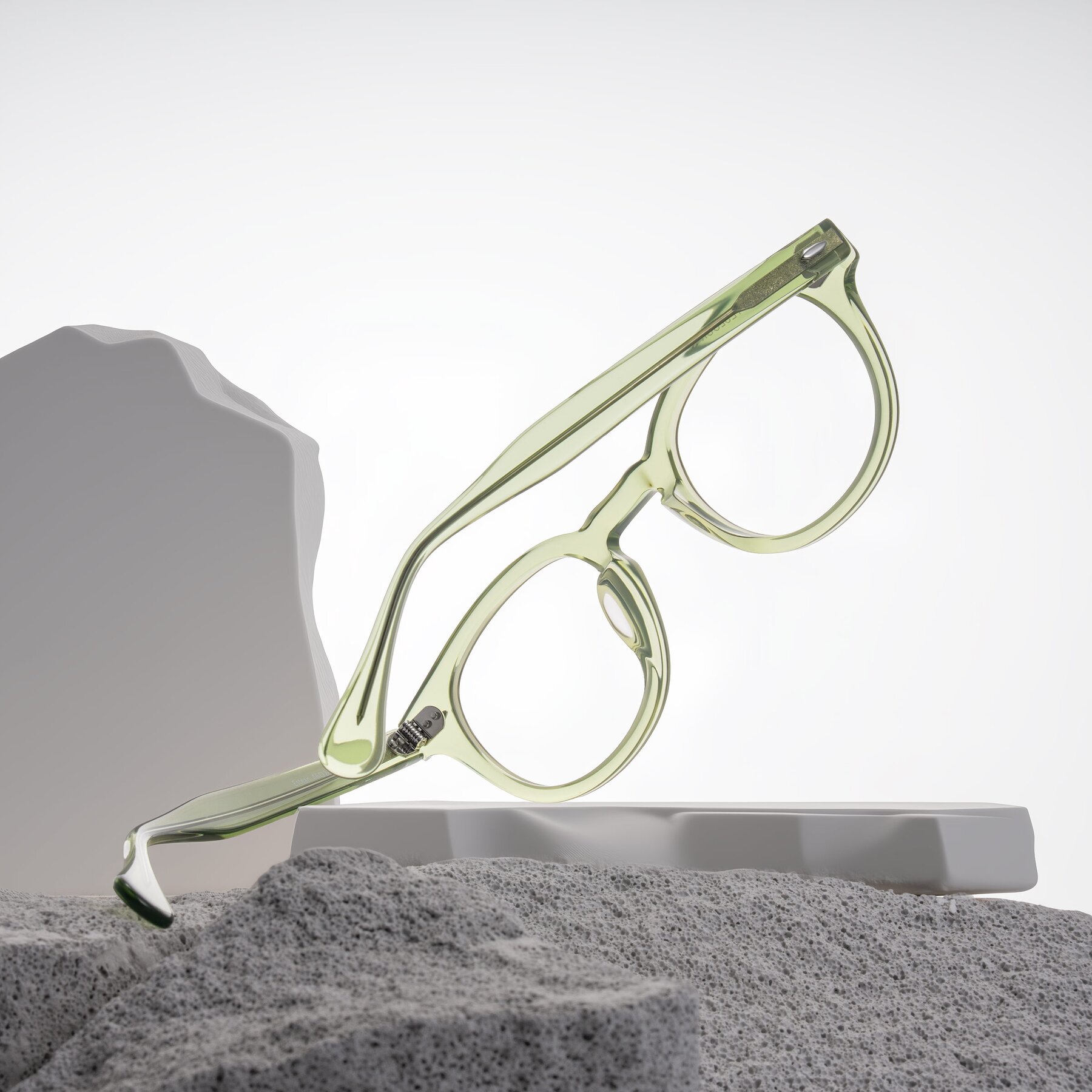 Lifestyle photography #2 of Estean in Transparent Green with Clear Eyeglass Lenses