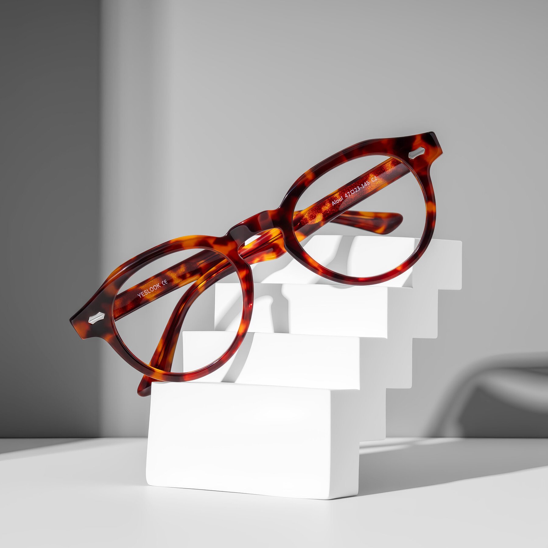 Lifestyle photography #2 of Aloul in Tortoise with Clear Eyeglass Lenses