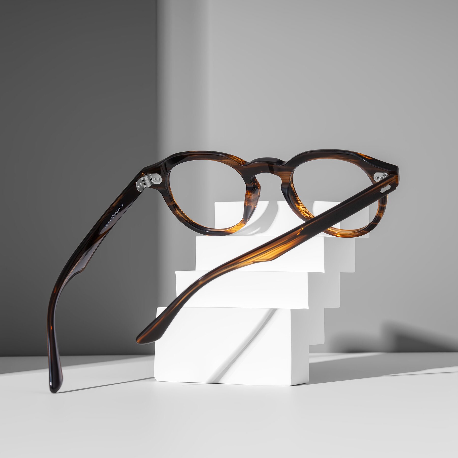 Lifestyle photography #2 of Aloul in Brown Striped with Clear Eyeglass Lenses