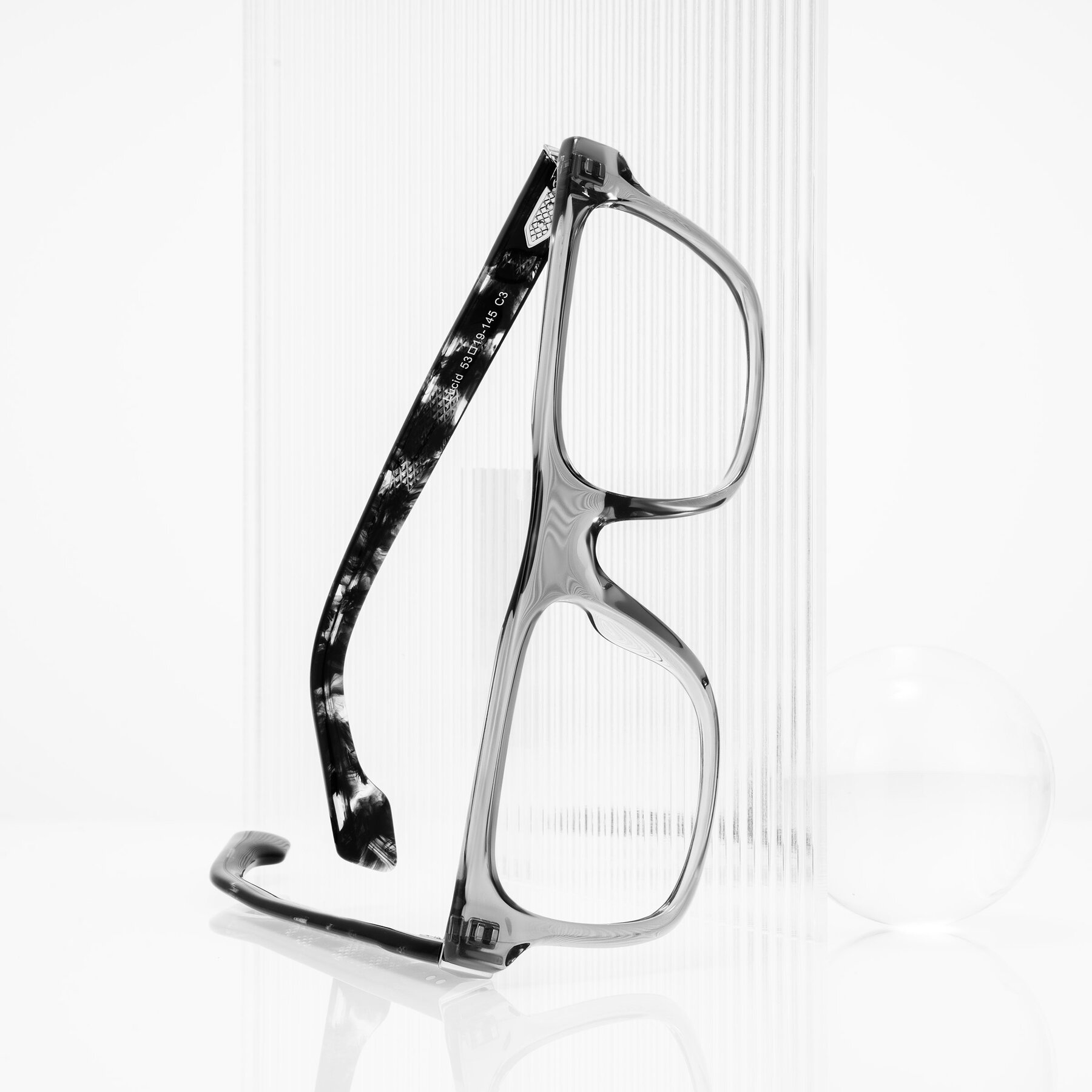 Lifestyle photography #1 of Lucid in Transparent Gray/Tortoise with Clear Eyeglass Lenses