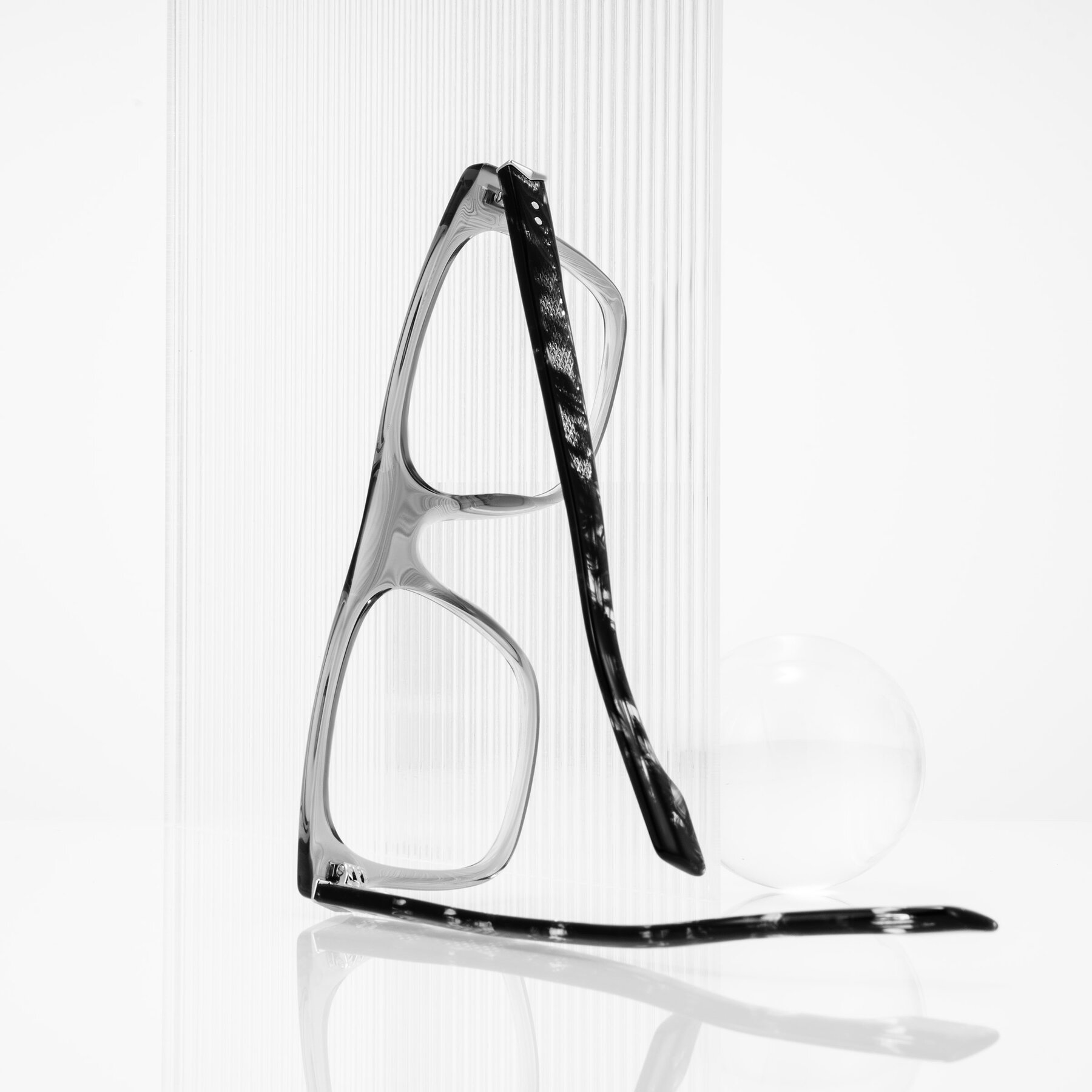 Lifestyle photography #2 of Lucid in Transparent Gray/Tortoise with Clear Eyeglass Lenses