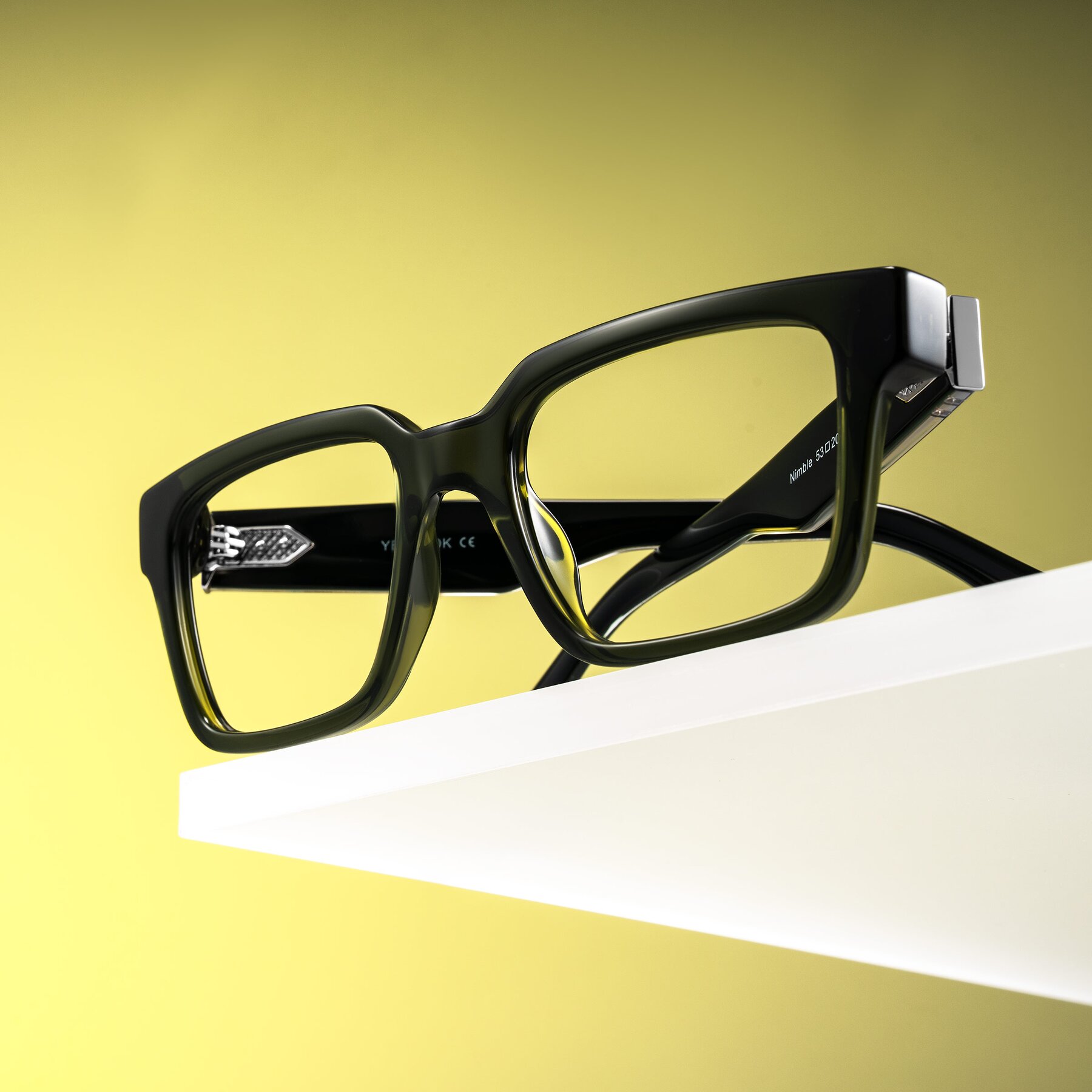 Lifestyle photography #1 of Nimble in Dark Green with Clear Eyeglass Lenses