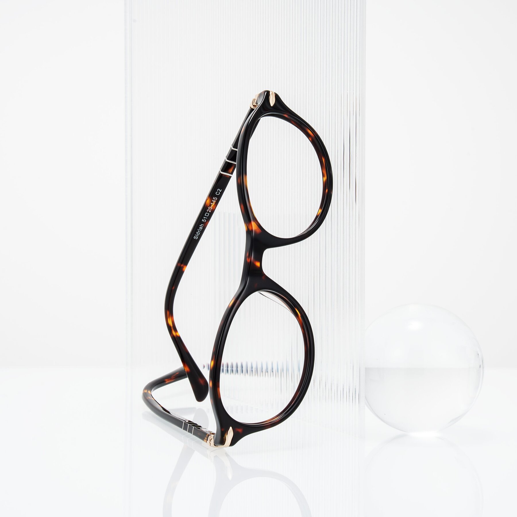 Lifestyle photography #1 of Sidriah in Tortoise with Clear Eyeglass Lenses