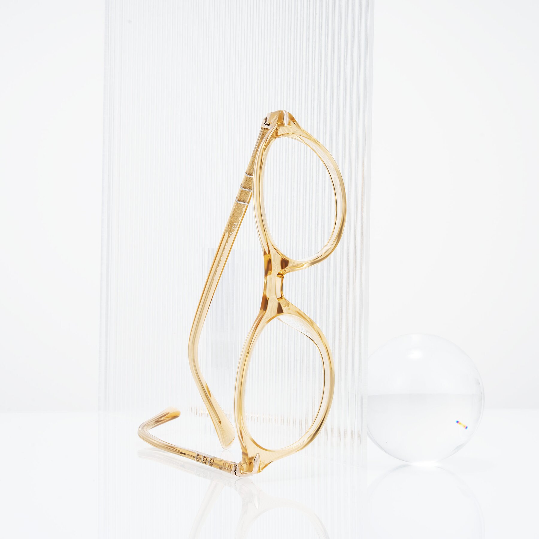 Lifestyle photography #1 of Sidriah in Transparent Amber with Clear Eyeglass Lenses
