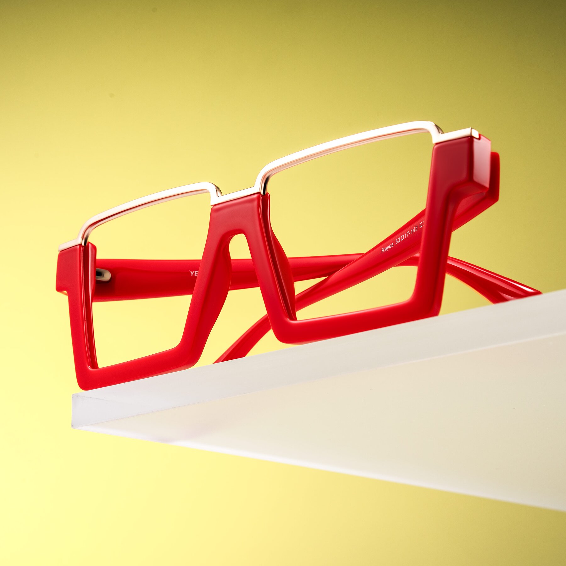Lifestyle photography #1 of Reyes in Red with Clear Eyeglass Lenses