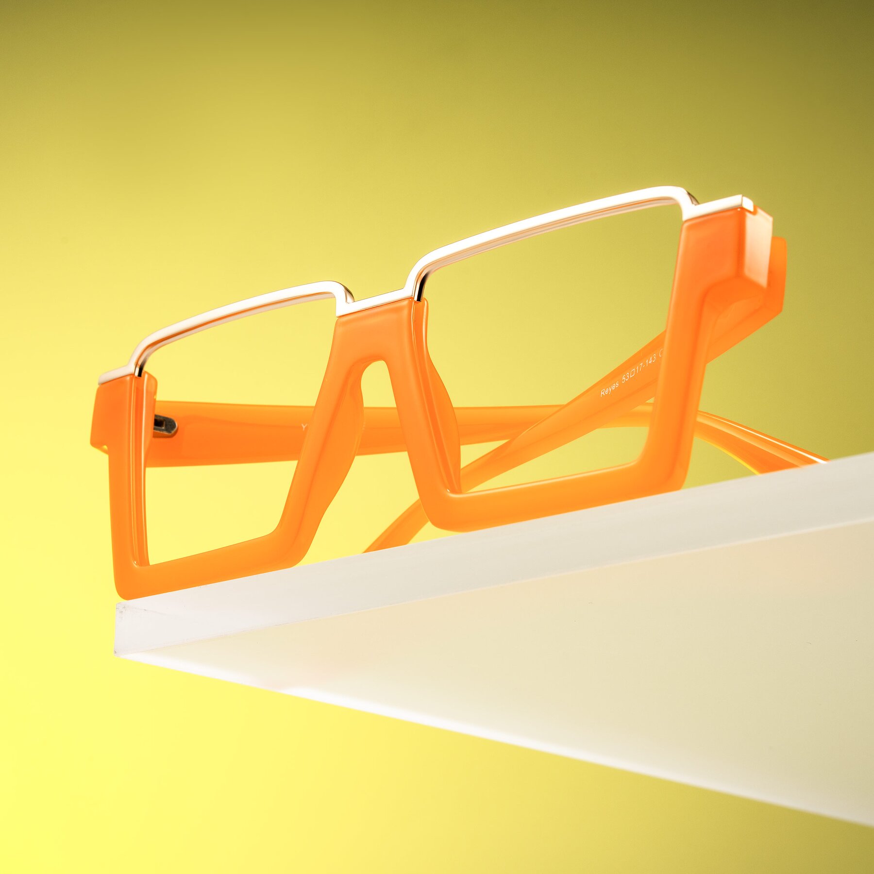 Lifestyle photography #1 of Reyes in Orange with Clear Eyeglass Lenses