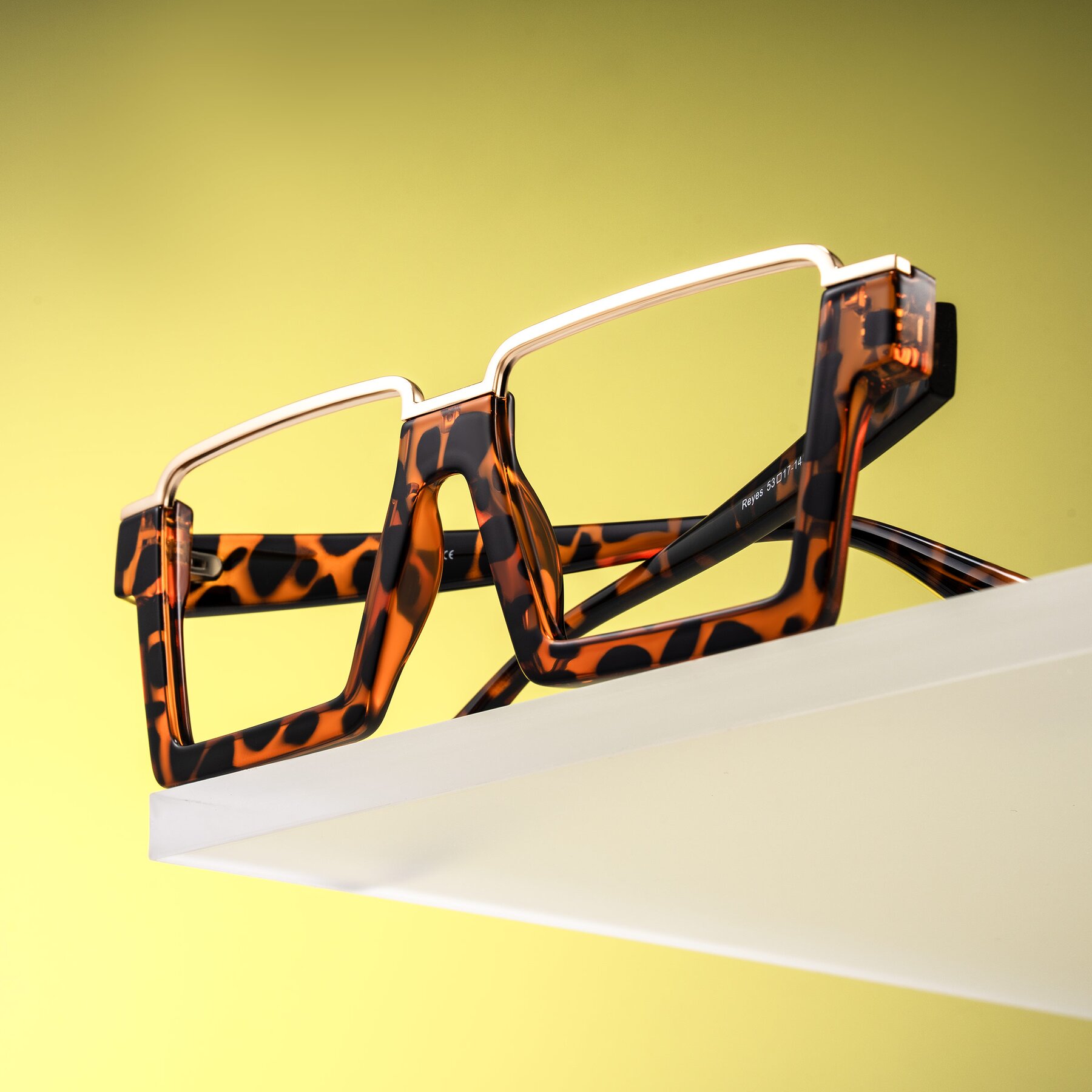 Lifestyle photography #1 of Reyes in Leopard-Print with Clear Eyeglass Lenses