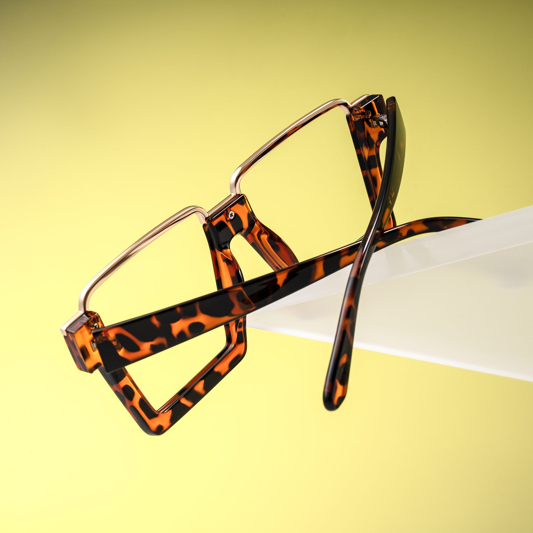 Lifestyle photography #2 of Reyes in Leopard-Print with Clear Eyeglass Lenses