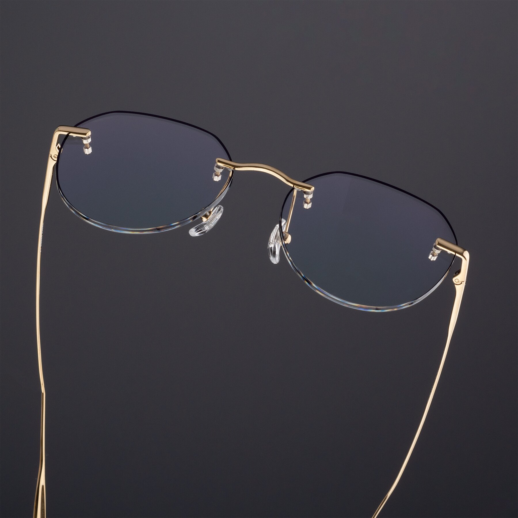 Women's lifestyle photography #1 of Torres in Gold-Black with Clear Blue Light Blocking Lenses