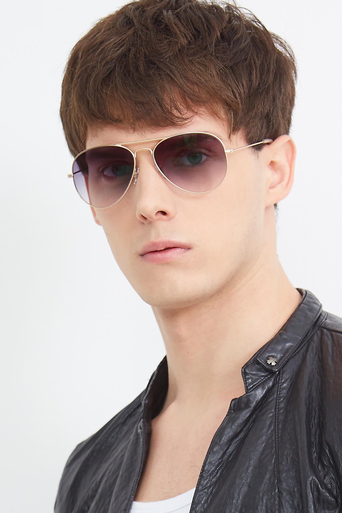 Men's lifestyle photography (portrait-1) of Yesterday in Jet Gold with Gray Gradient Lenses