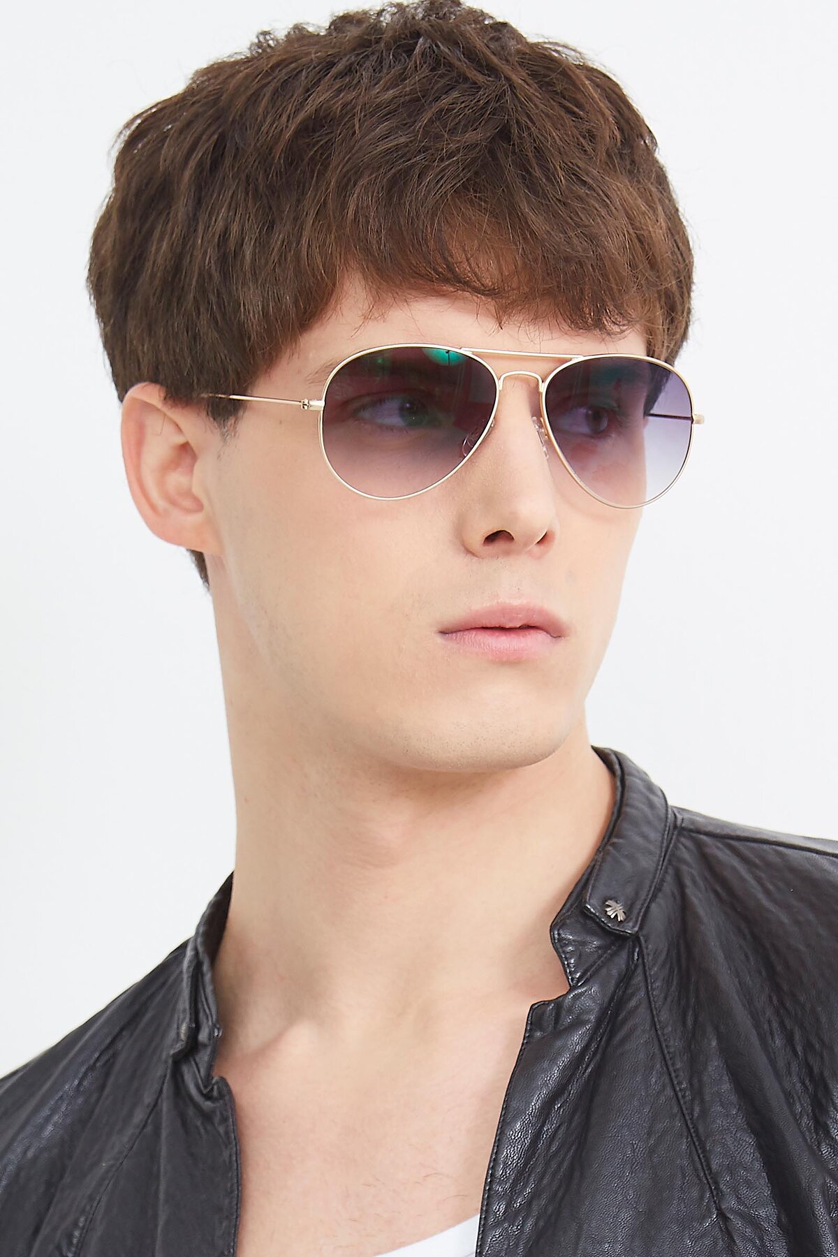 Men's lifestyle photography (portrait-2) of Yesterday in Jet Gold with Gray Gradient Lenses
