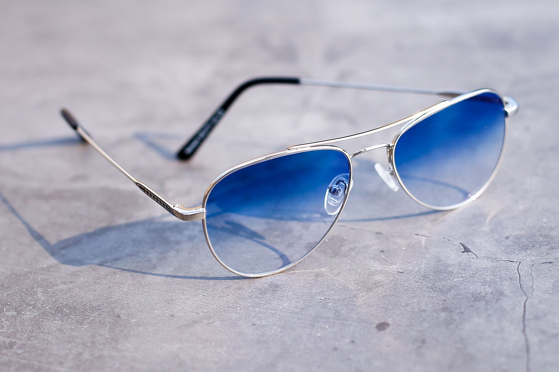 Lifestyle photography #2 of Richard in Silver with Blue Gradient Lenses