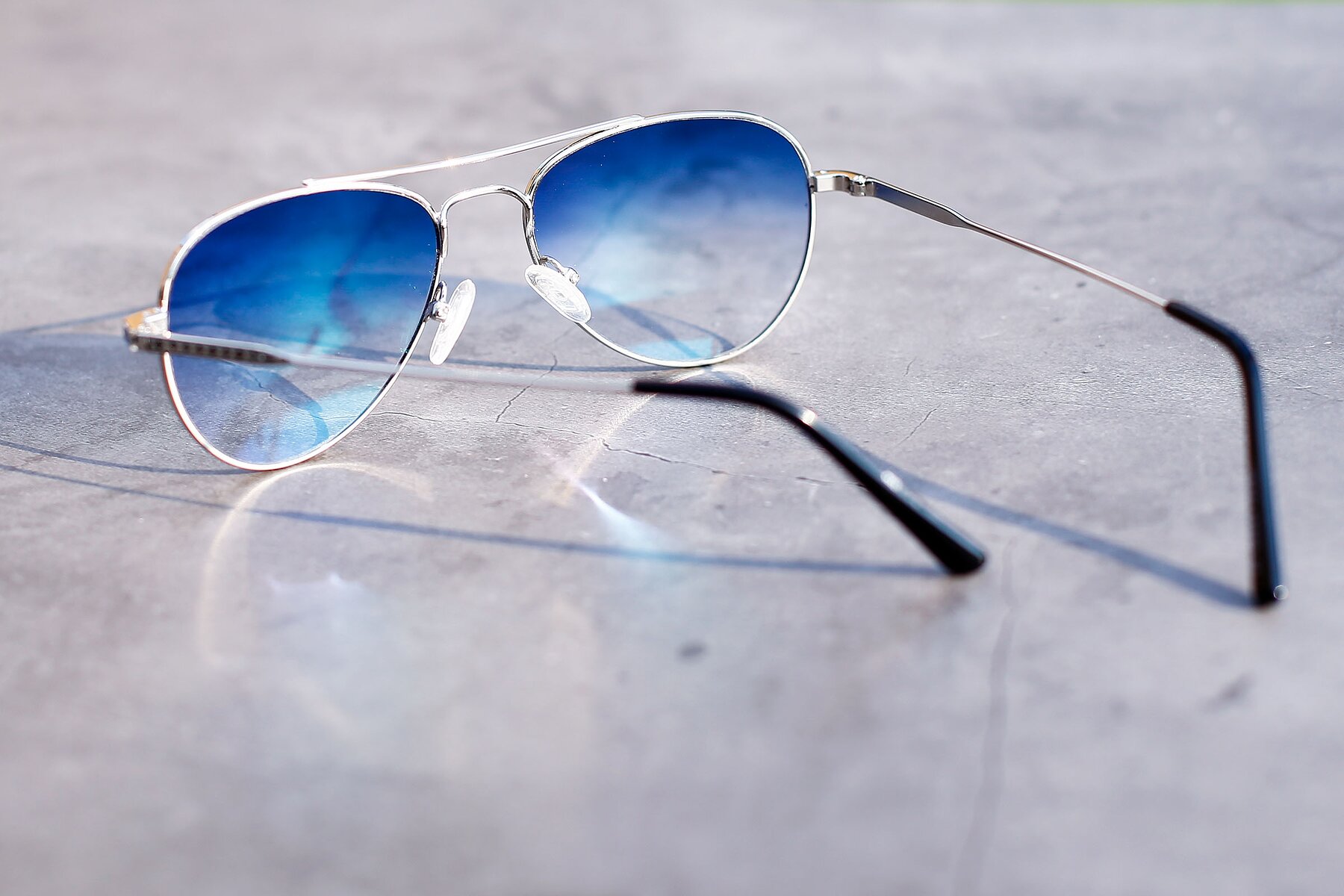 Lifestyle photography #3 of Richard in Silver with Blue Gradient Lenses