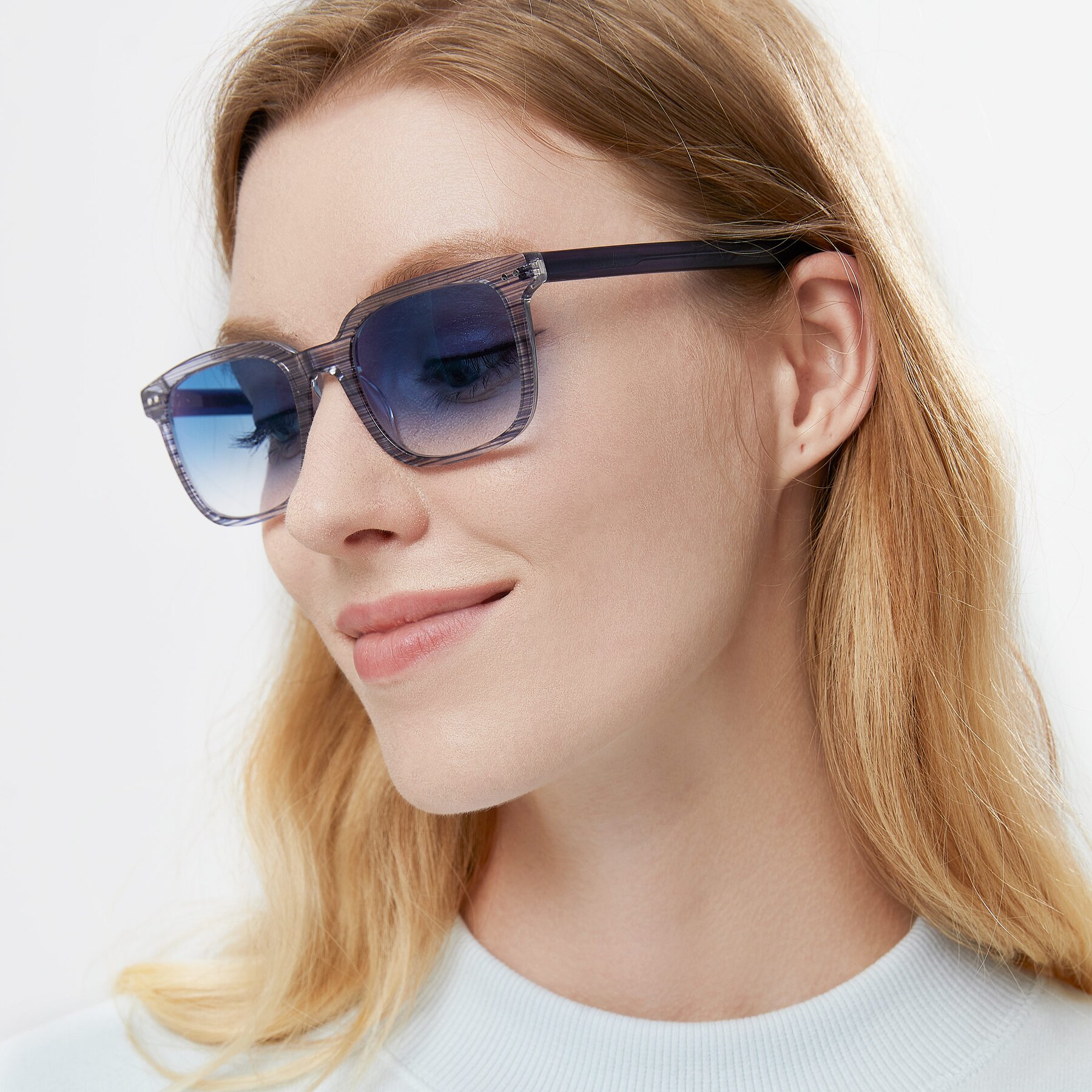 Women's lifestyle photography of 17457 in Stripe Blue with Blue Gradient Lenses